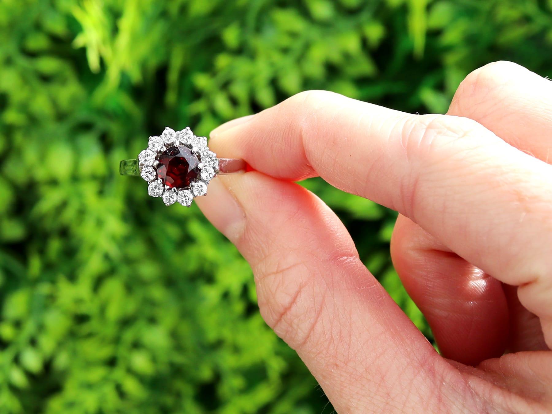 A fine and impressive vintage 1.05 carat garnet and 0.36 carat diamond, 18 karat white gold cluster ring; part of our vintage jewelry and estate jewelry collections.

This fine and impressive garnet cluster ring has been crafted in 18k white
