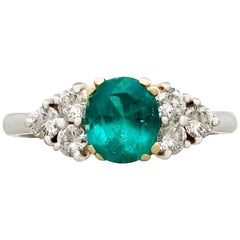 1990s 1.06 Carat Emerald and Diamond Platinum Cocktail Ring