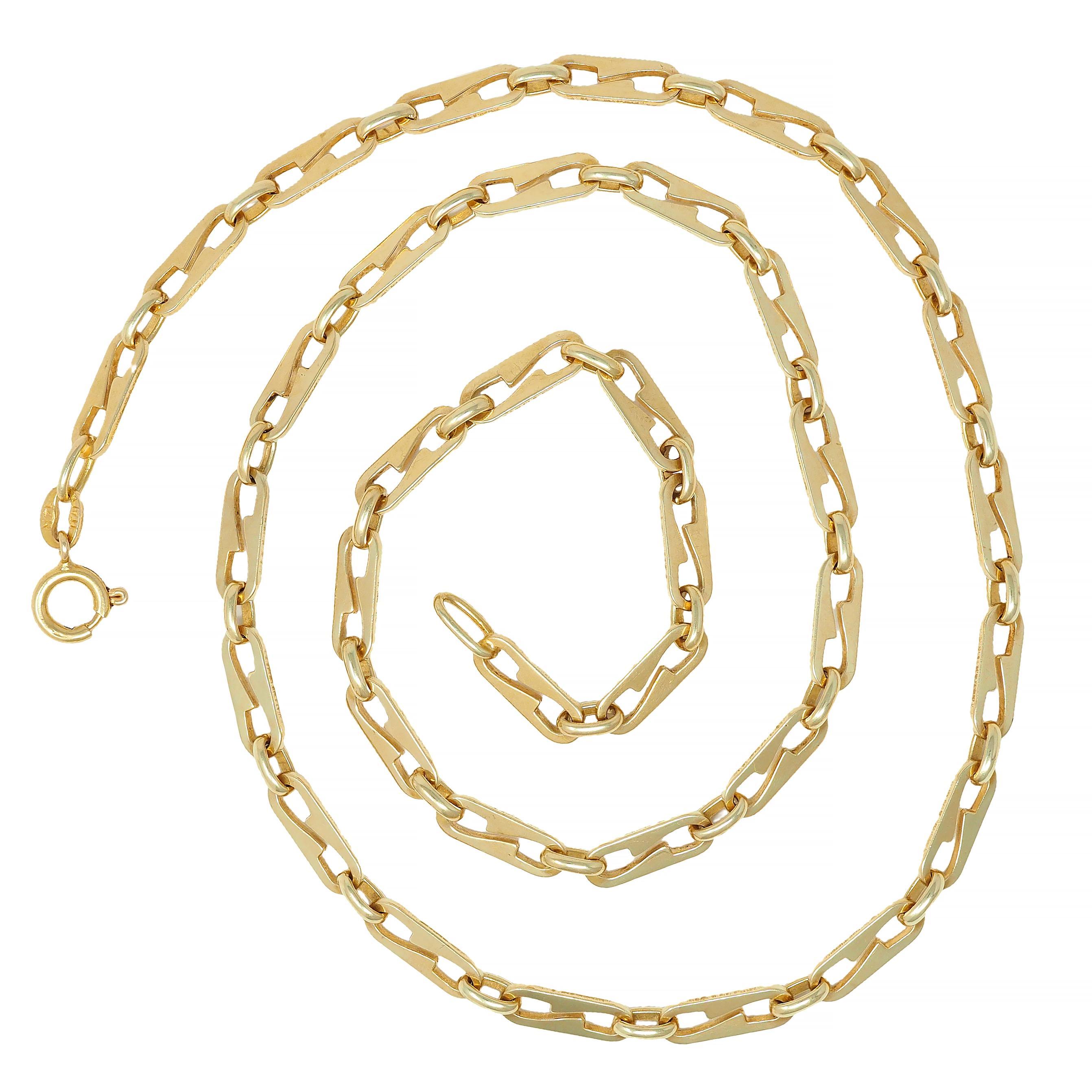 Designed as a paperclip style chain pierced with an 'S' motif
Alternating with oval shaped jump rings 
With high polish finish
Completed by spring clasp closure
Stamped for 14 karat gold
Signed for Italy
Circa: 1990s 
Width at Widest: 3/16
