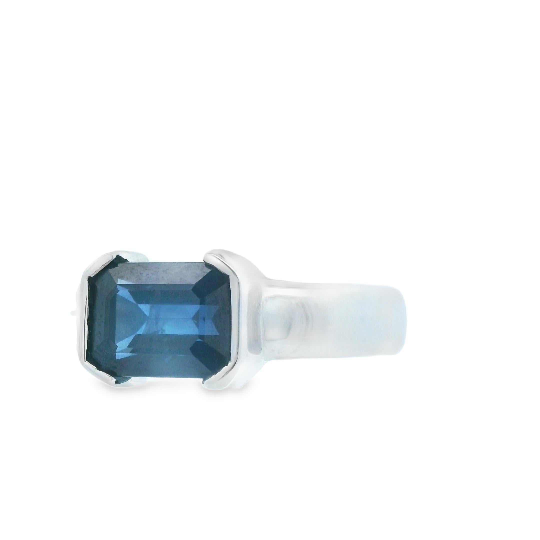 Women's 1990s 14k White Gold and Emerald Cut Blue Sapphire Solitaire Ring /w Report For Sale