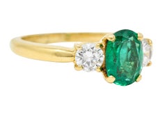 1990's 1.60 CTW Oval Cut Zambian Emerald Diamond 18 Karat Yellow Gold Ring