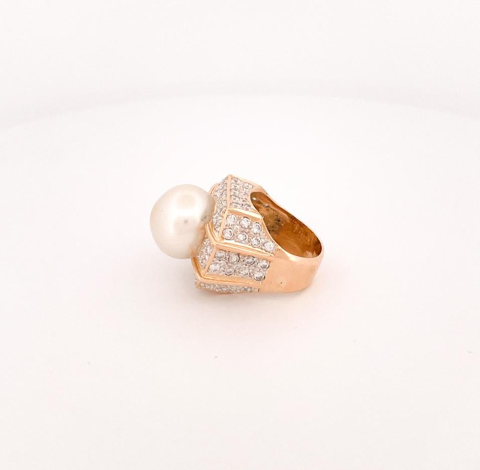 From the Eiseman Jewels Estate collection, circa 1990's, 18k yellow gold white south sea pearl and diamond ring. This ring is crafted with 15.33MM white south sea pearl surrounded by 92 pave round brilliant cut diamonds weighing approximately 1.84