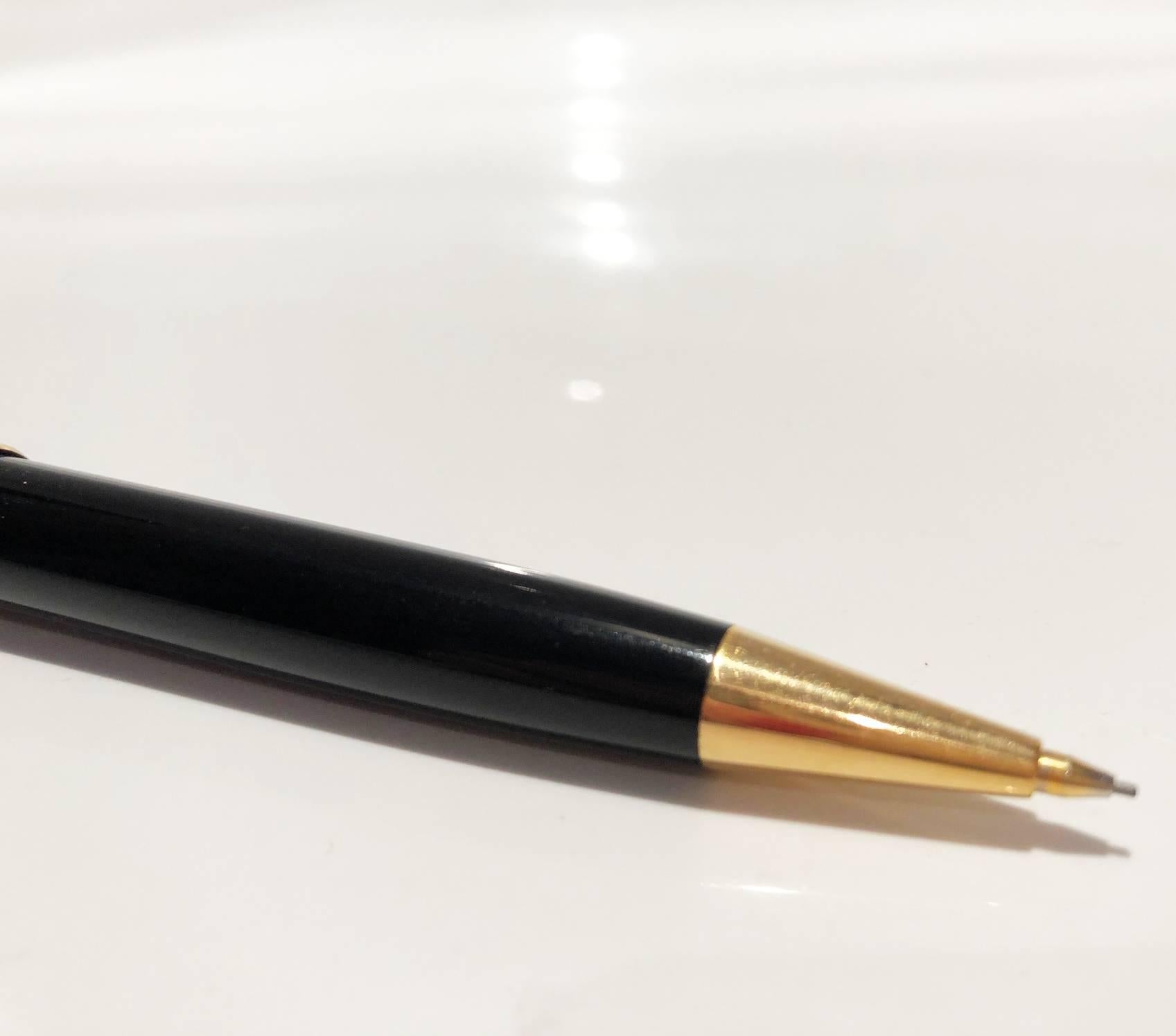 Meisterstück Gold-Coated Classique Mechanical Pencil, Gold-coated clip with individual serial number, Black precious resin, Black precious resin inlaid with Montblanc emblem
Condition: good working order, slight sign (barely visible) if usage but