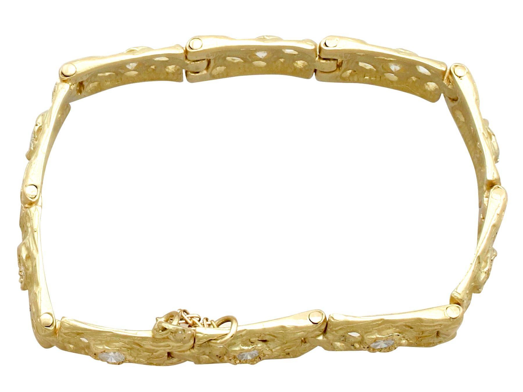 An impressive vintage 1990s 2.10 carat diamond and 18 karat yellow gold bracelet; part of our diverse diamond jewelry and estate jewelry collections.

This fine and impressive gold and diamond bracelet has been crafted in 18k yellow gold.

The
