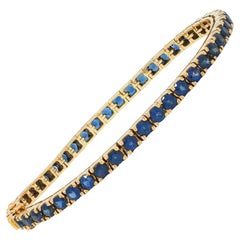 1990's 6.90 CTW Sapphire 18 Karat Yellow Gold Vintage Line Bracelet