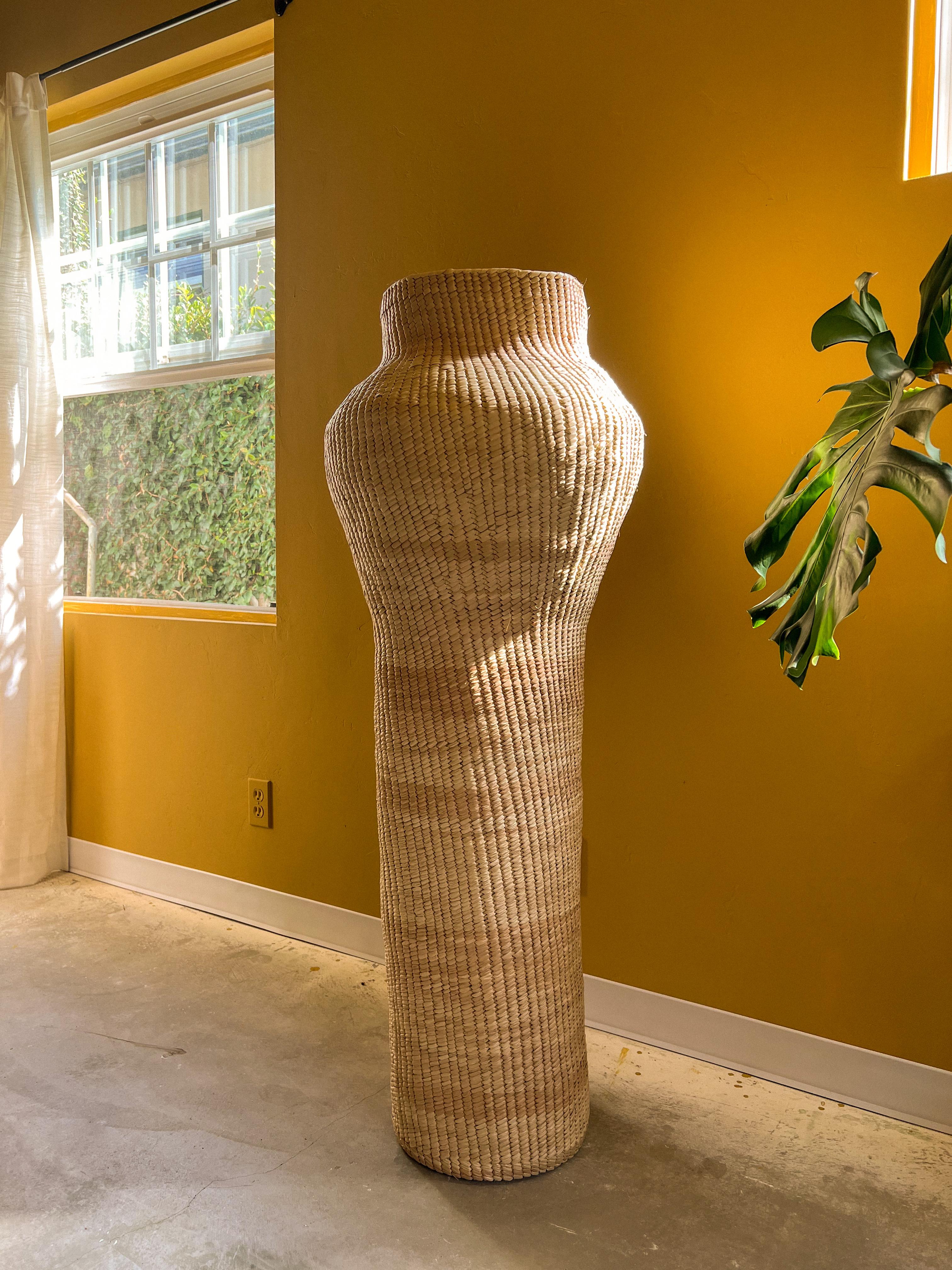 These oversized handwoven palm sculptures are masterpieces crafted by skilled artisans in Oaxaca using traditional caña palm weaving techniques passed down through generations. Each sculpture is a unique, one-of-a-kind piece that embodies the rich
