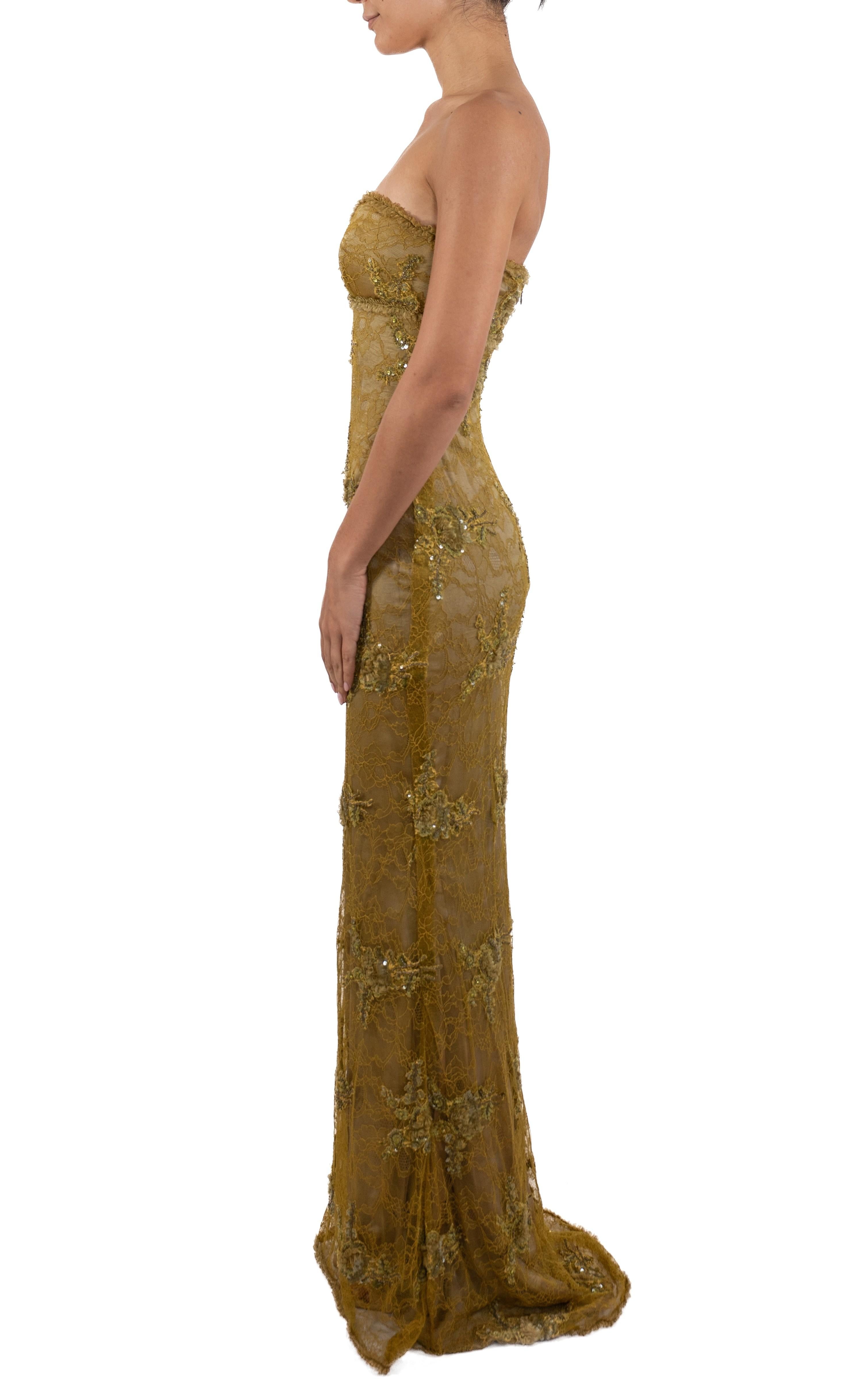 This gown retains no label, however the amount of hand-finishing points to Haute Couture or custom made quality, fully lined in silk. 1990S Acid Green Beaded Silk & Lace Strapless Empire-Waist Gown 