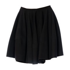 1990S ALAIA Jupe évasée plissée en laine noire