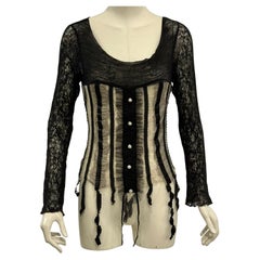 1990s Alexander McQueen lace corset top with crystal buttons