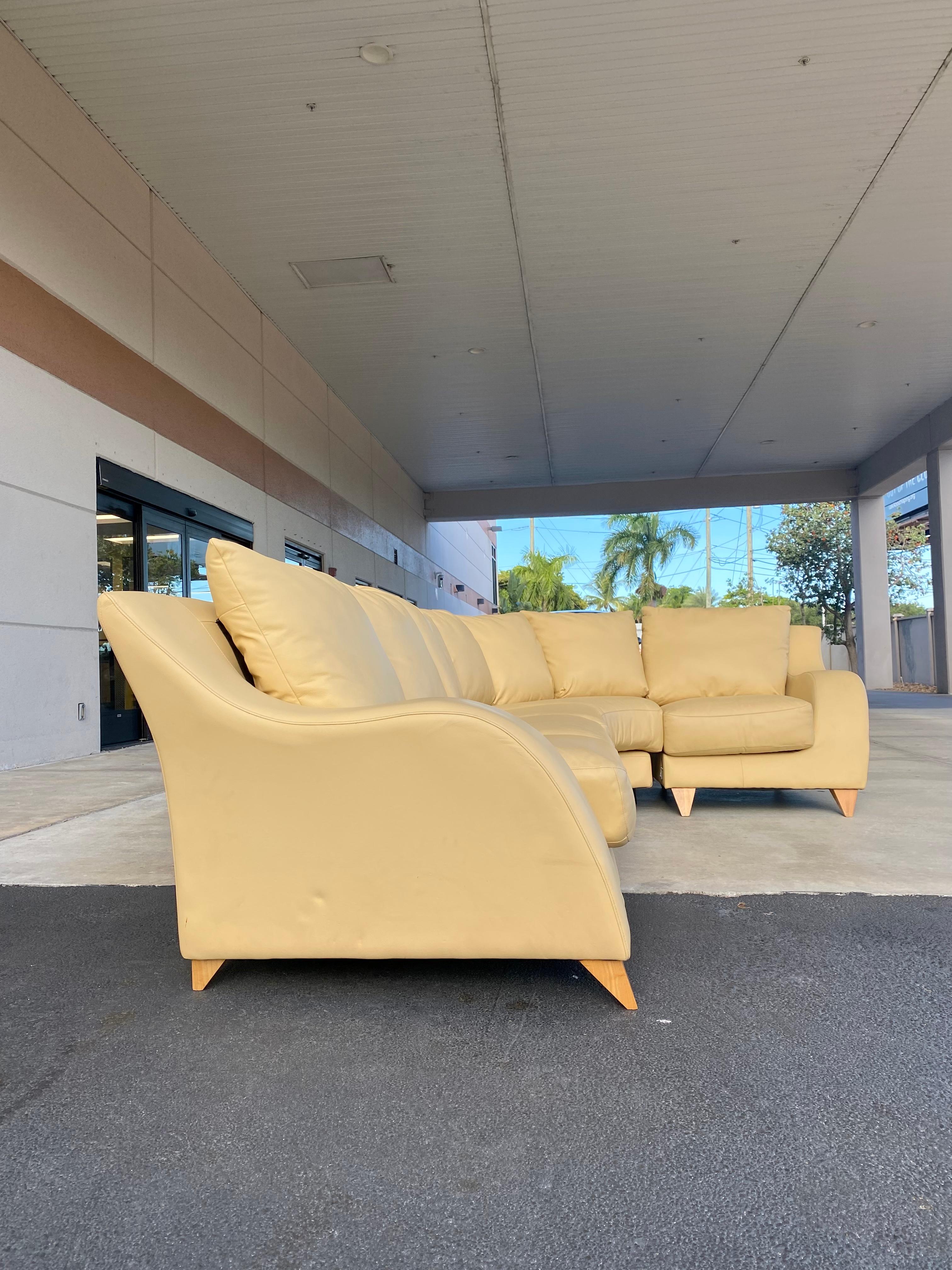 white leather curved sectional