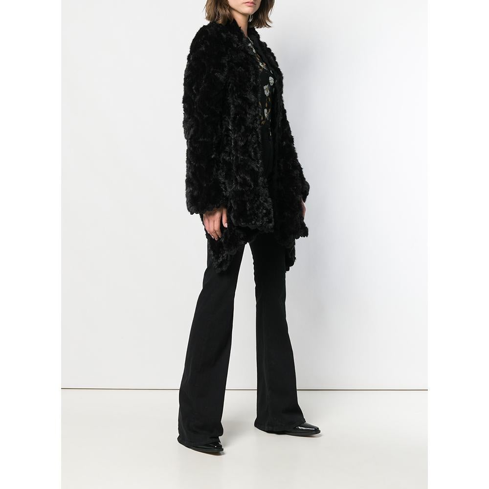 A.N.G.E.L.O. Vintage Cult black rabbit fur open jacket. Waterfall model with short back and longer front flaps, long sleeves.

Please note that this item cannot be shipped outside the European Union.

Years: 90s

Size: One Size

Flat