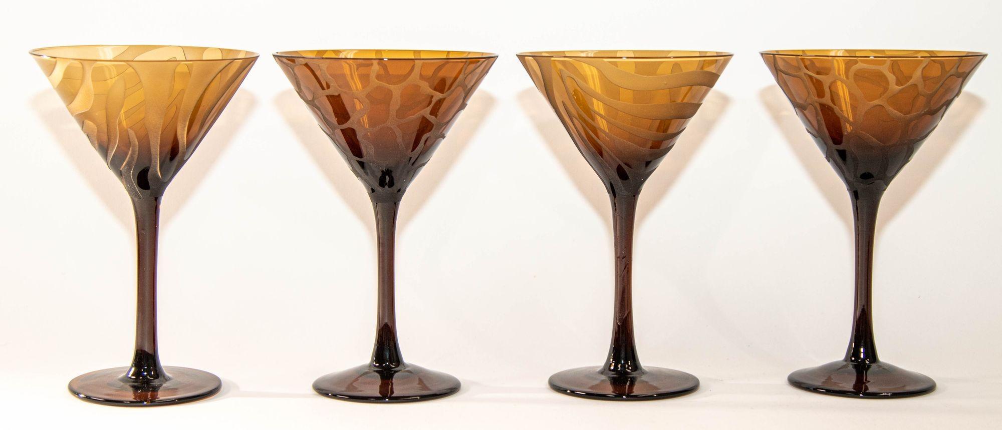 1990s Murano etched glass Martini Stemmed Glasses.
This is an amazing set of 4 exotic Martini Glasses, Tortoise, Animal Print Barware.
Set of four martini glasses features burnt amber bowls and stems.
These splendid late 20th century glasses are