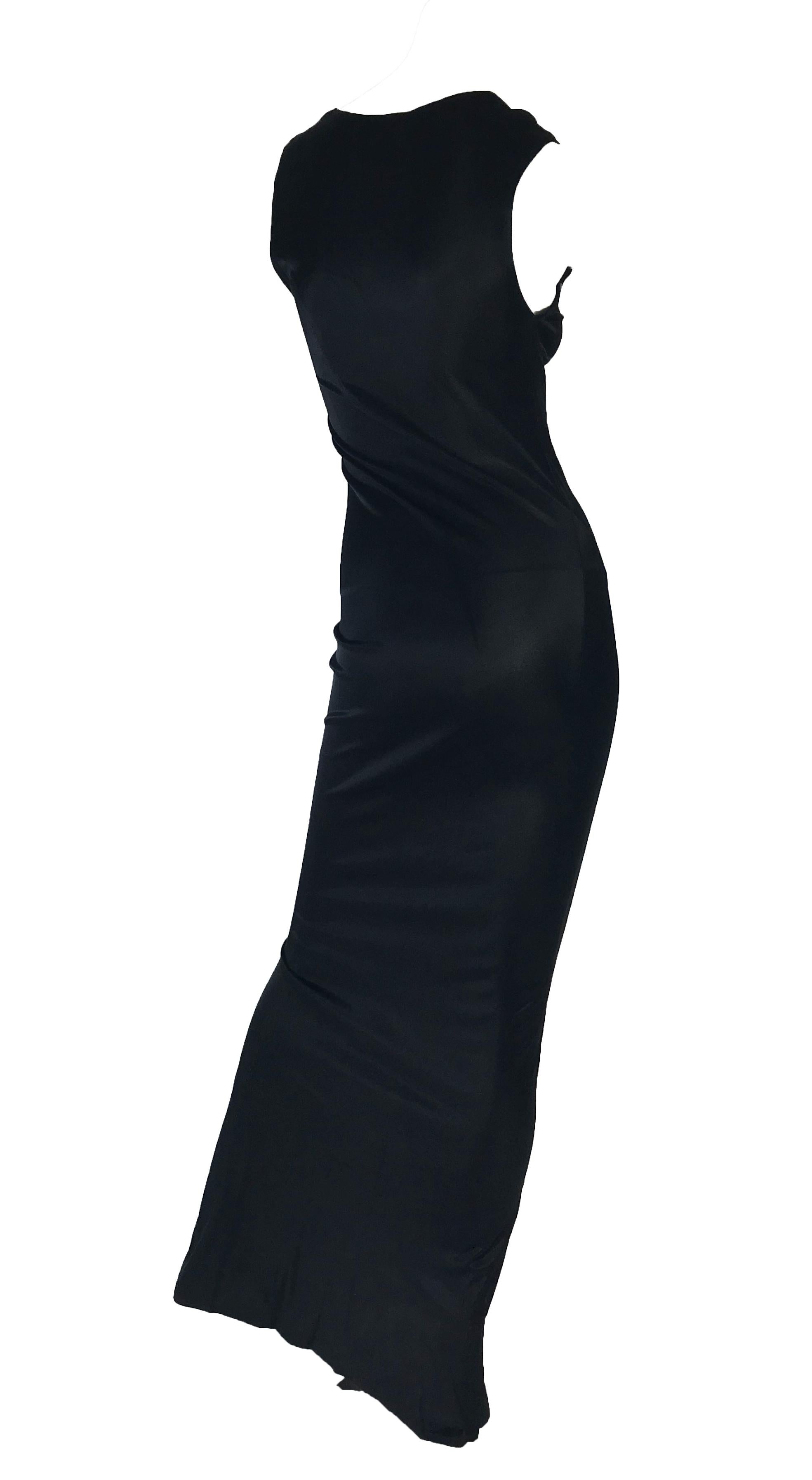 1990s Ann Demeulemeester black form fitting sleevless gown with kick pleat. 
Condition: Excellent. 
Size 4 - 6 