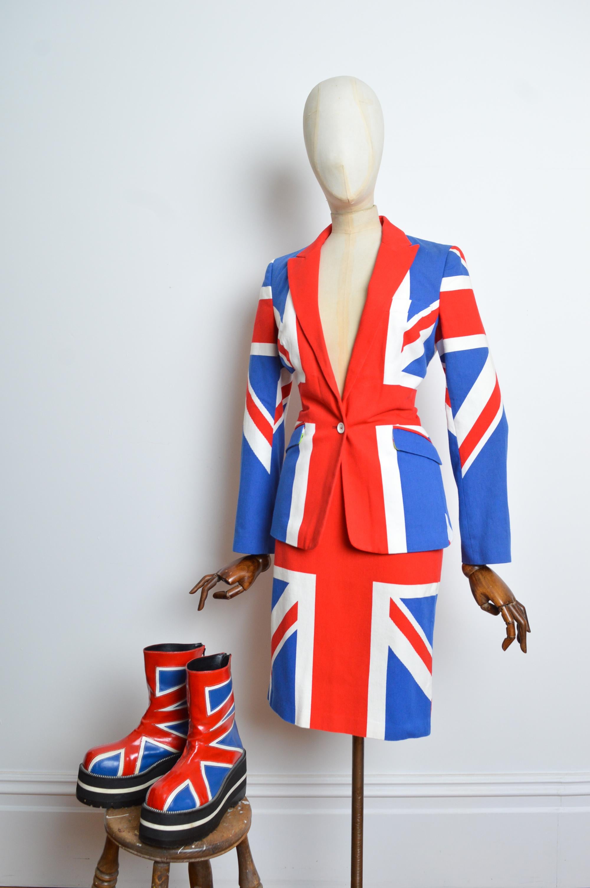 Incredible 1990’s Union Jack platform boots with PVC appliqué, zip down rear and chunky 8.5cm Sole. (28.5cm Tall in total). 
Bespoke 1990's. One of a Kind.
These are the only pair we have ever seen. 
Size; EU 39-39.5 / UK 6-6.5
Measurements are