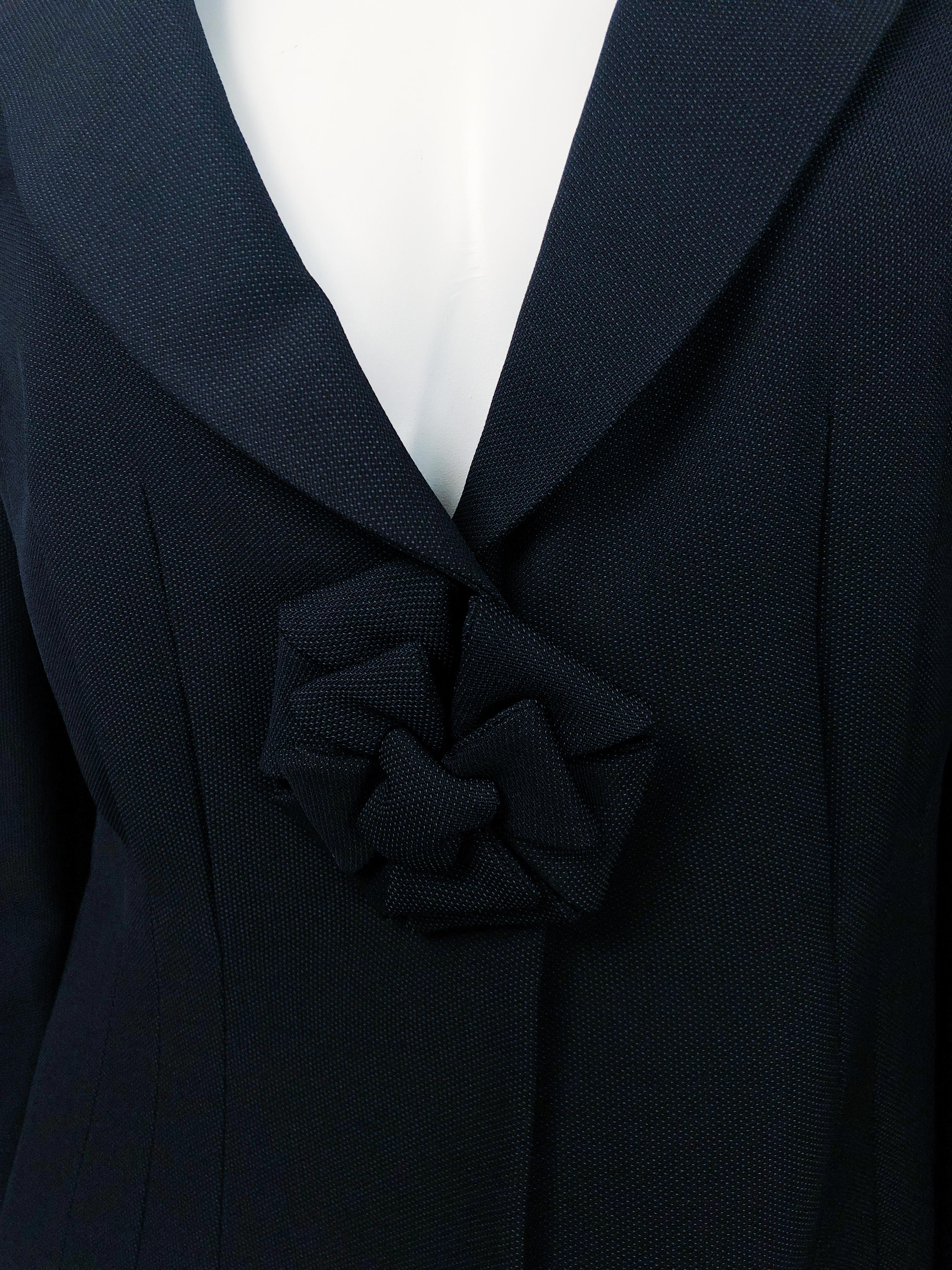 1990s Armani Black Wool Jacket With Cocarde Closure and knife pleated back.
