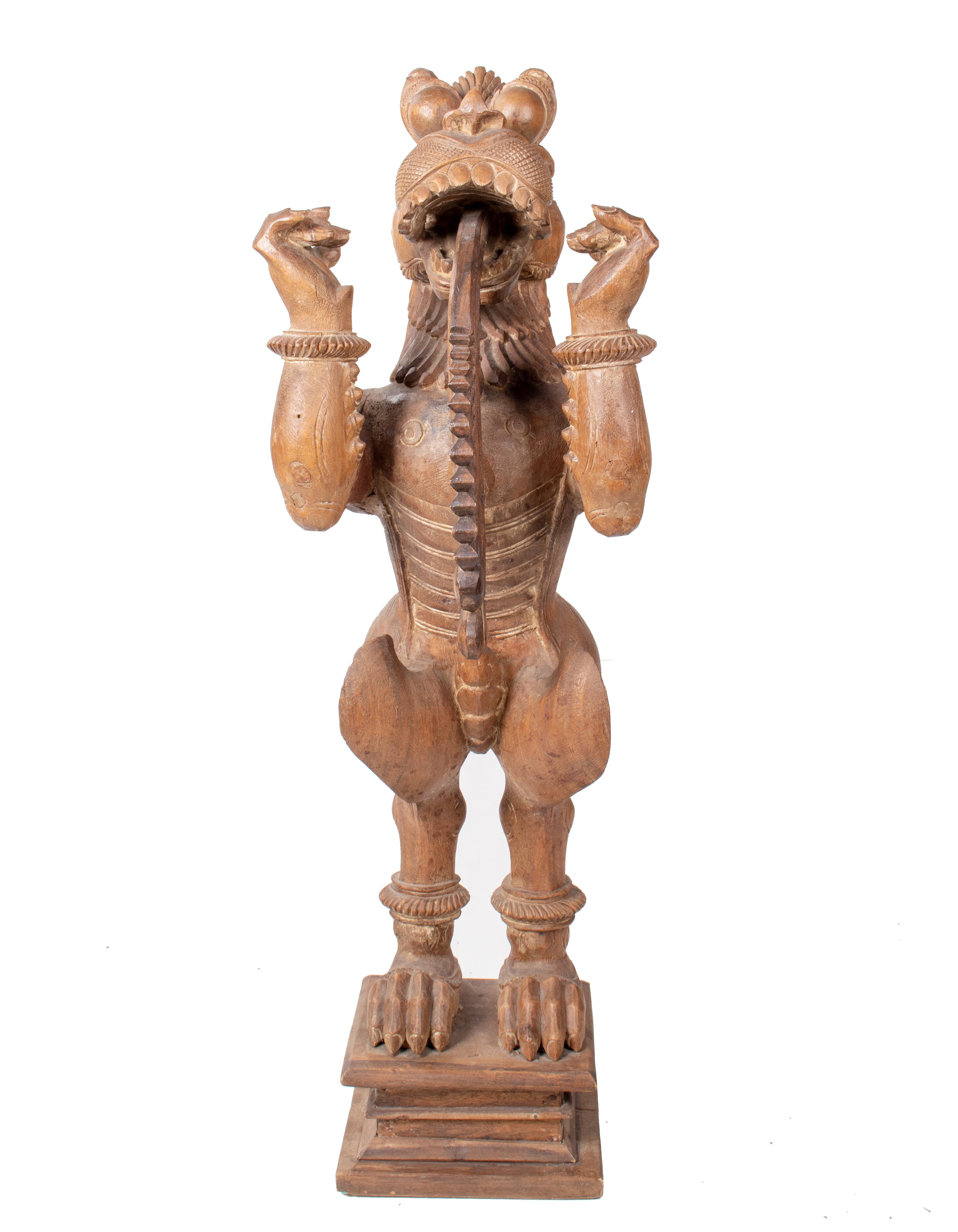 1990s Asian hand carved teak wood mythical animal sculpture.