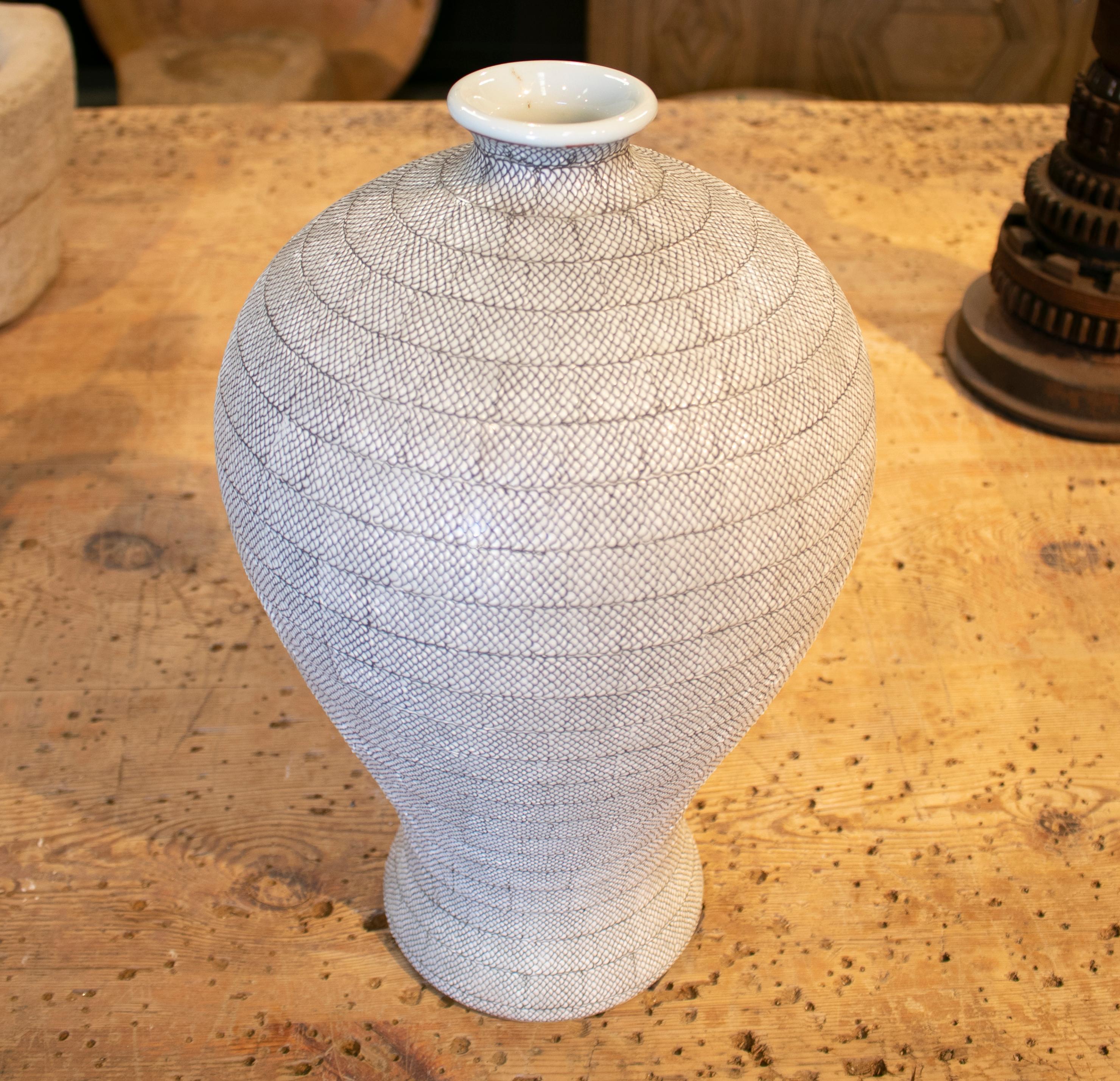 1990s Asiatic white ceramic vase with fish scales design.
