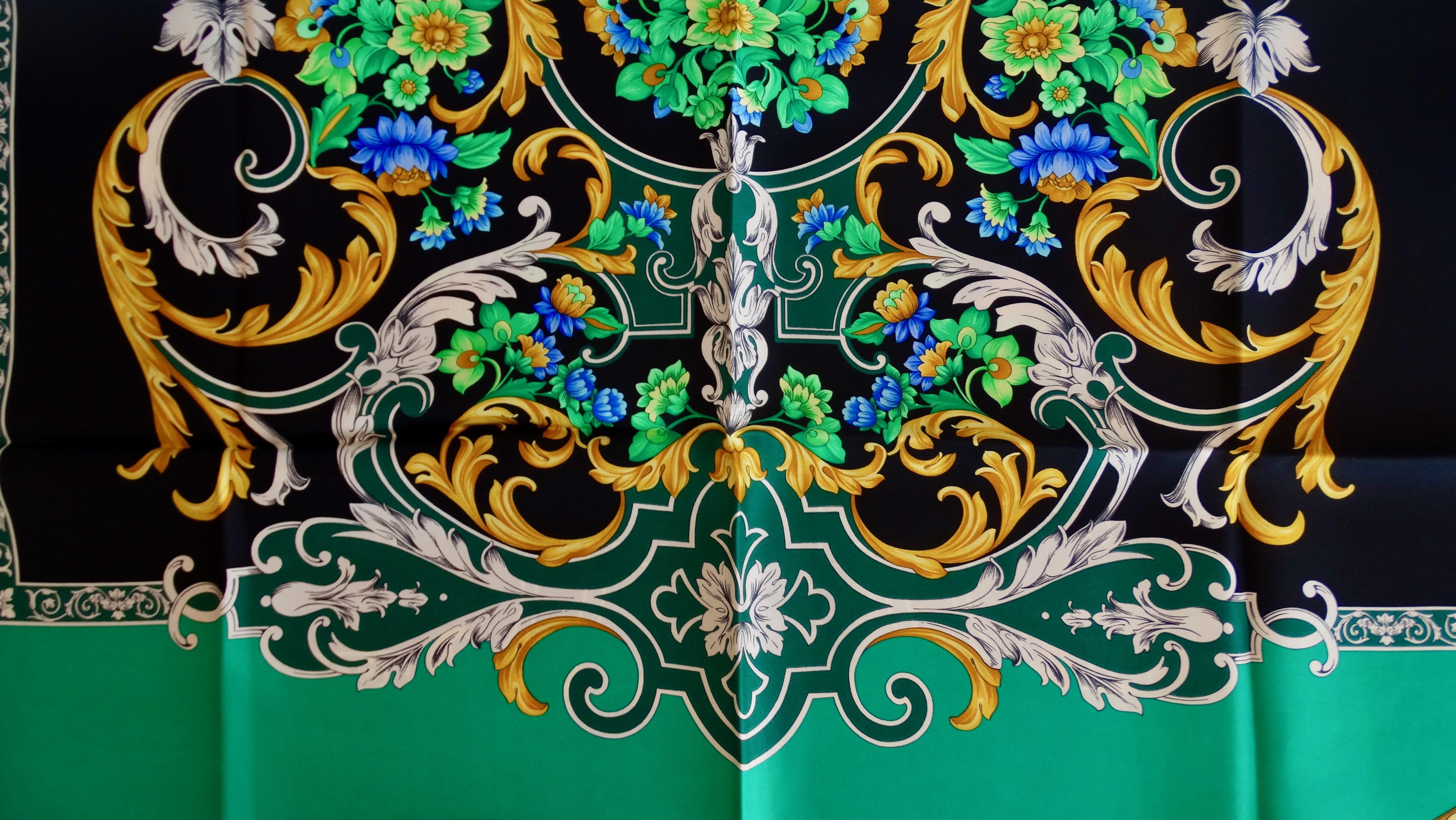 We all need a great scarf, especially Versace! Circa 1990s, this Atelier Versace Silk scarf features a gorgeous and iconic Baroque inspired design decorated with flowers. Includes Gianni Versace's initials at the top center and Atelier Versace in