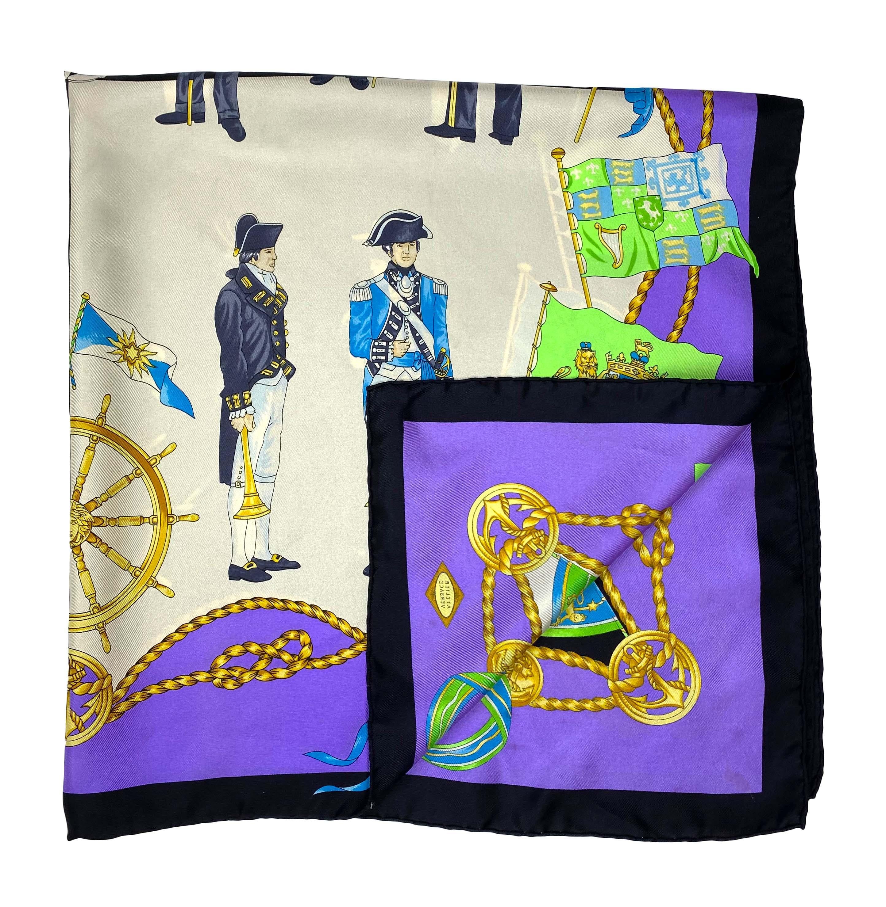 Presenting a nautical motif Atelier Versace scarf, designed by Gianni Versace. With a bright purple border, this scarf depicts naval seamen from different eras. Truly a work of art, this bright and lively scarf adds the perfect pop of color to any