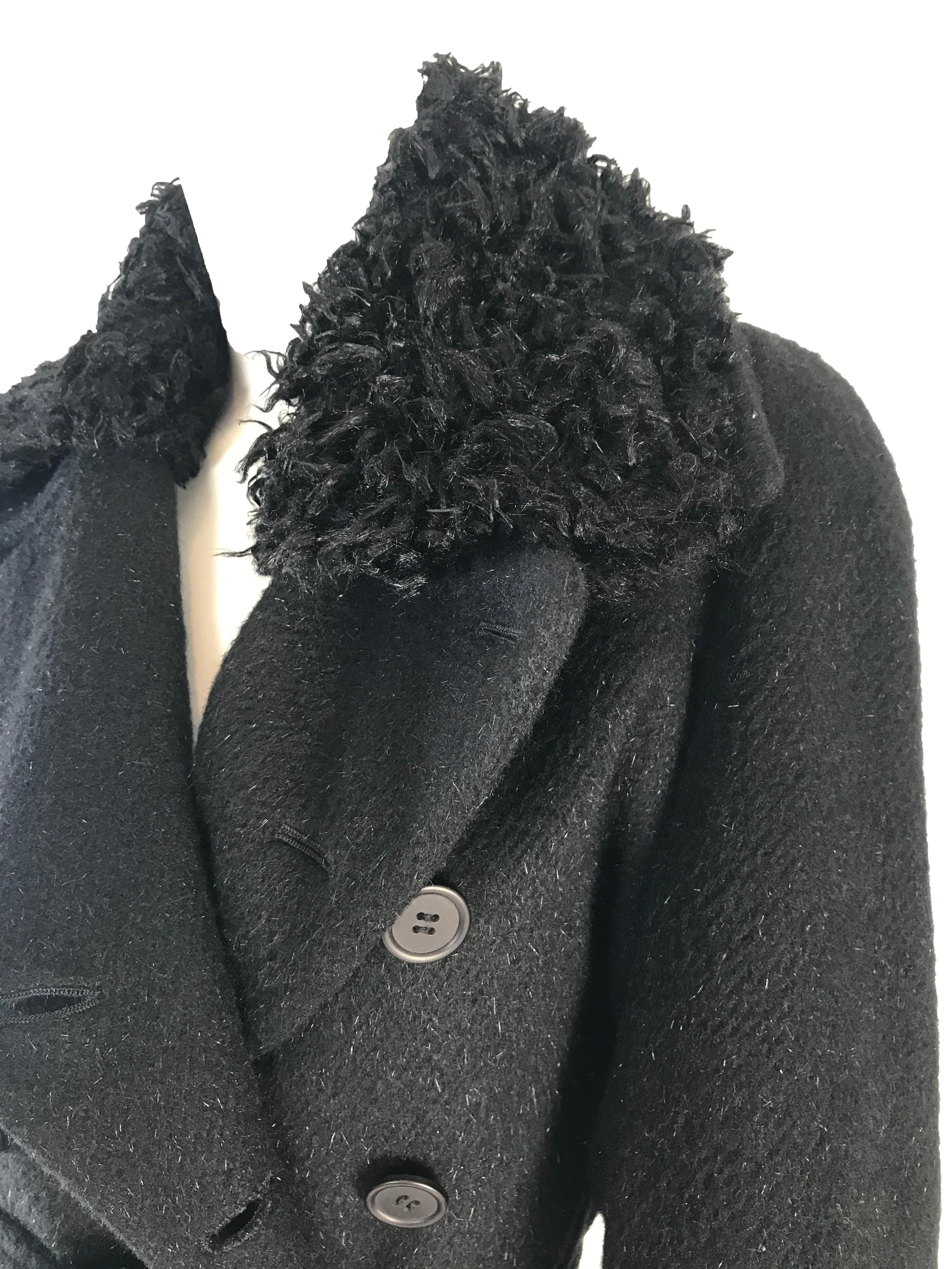 Manteau à ceinture en laine Atsura Tayama des années 1990.

Condit : Excellent
Taille 6 