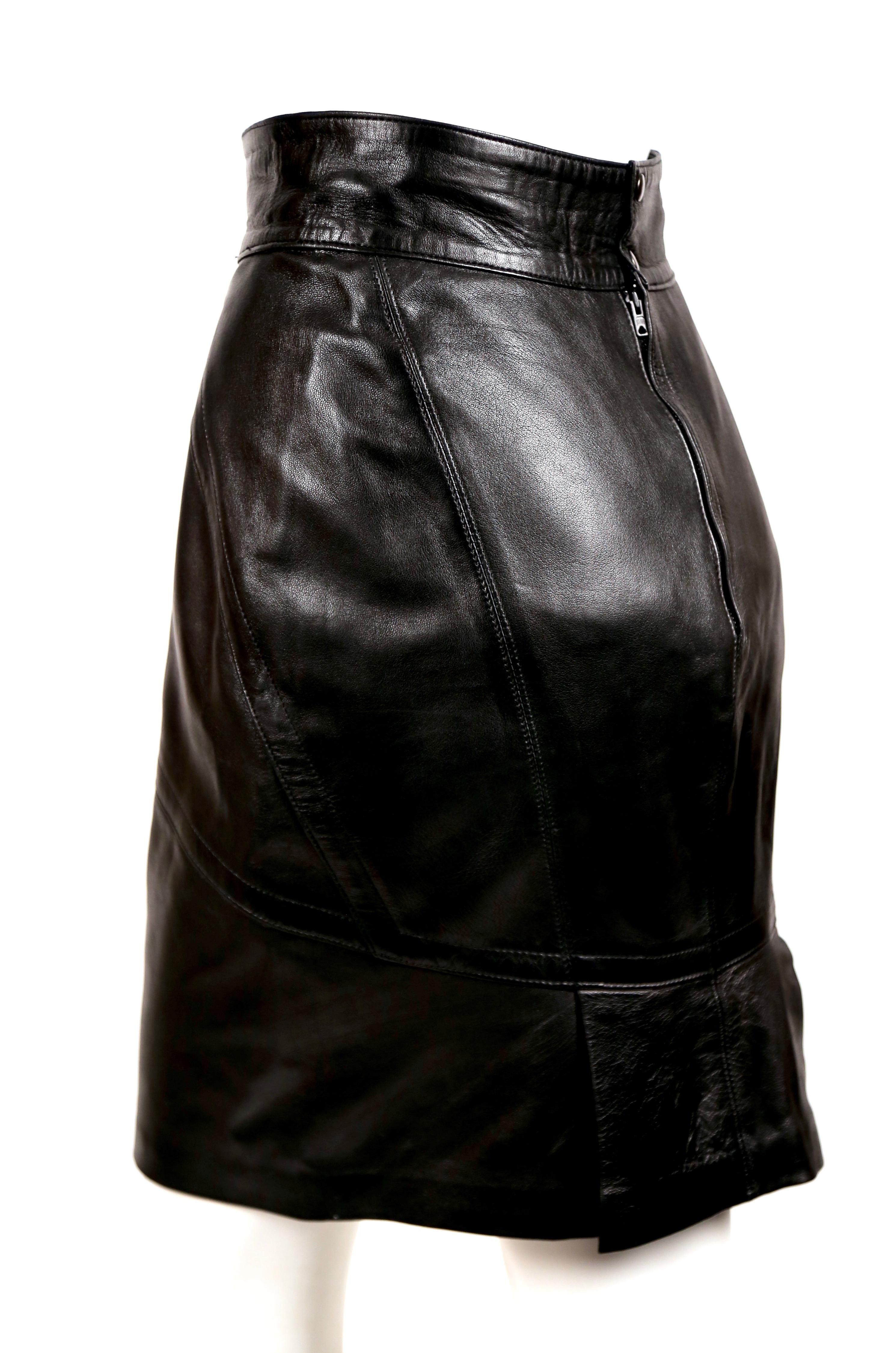 Jet black butter soft leather skirt with seaming and pleated hemline from Azzedine Alaia dating to the 1980's. French size 40 although this skirt is very small and best fits a US 4. Approximate measurements: waist 26