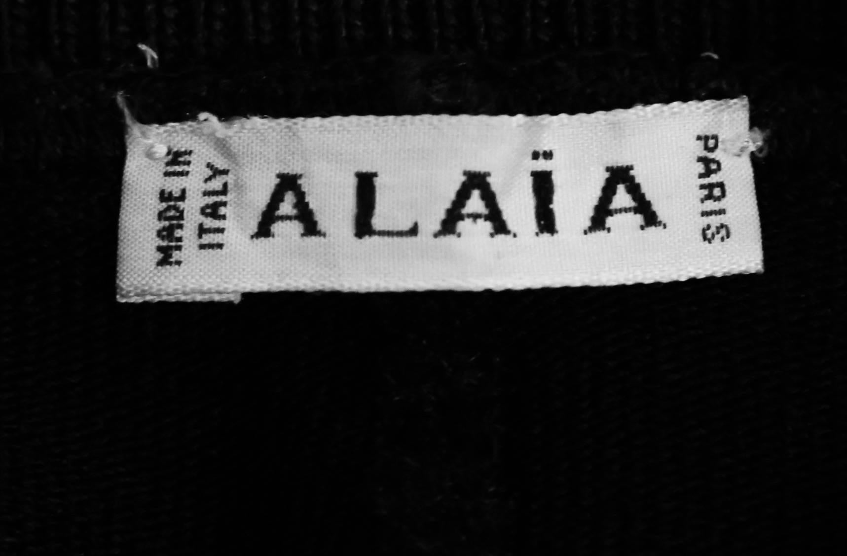 Women's or Men's 1990's AZZEDINE ALAIA black skirt with ruffled trim