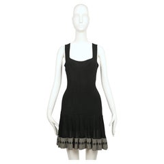 AZZEDINE ALAIA, abito senza maniche nero del 1990 con rifiniture in diamanti