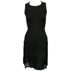 AZZEDINE ALAIA, abito nero senza maniche in maglia con orlo trasparente del 1990