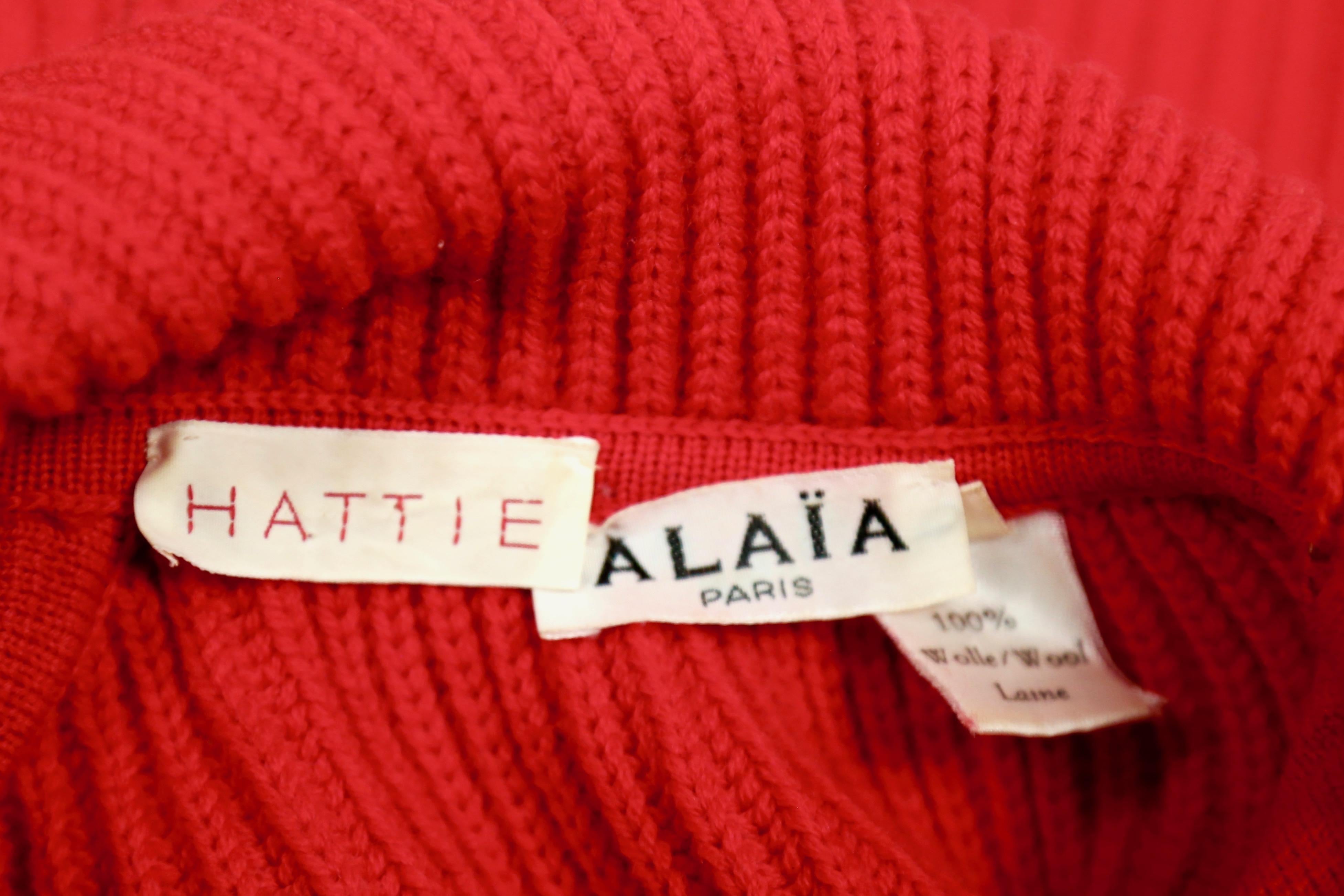 Women's or Men's 1990's AZZEDINE ALAIA red wool sweater with silver metal hooks