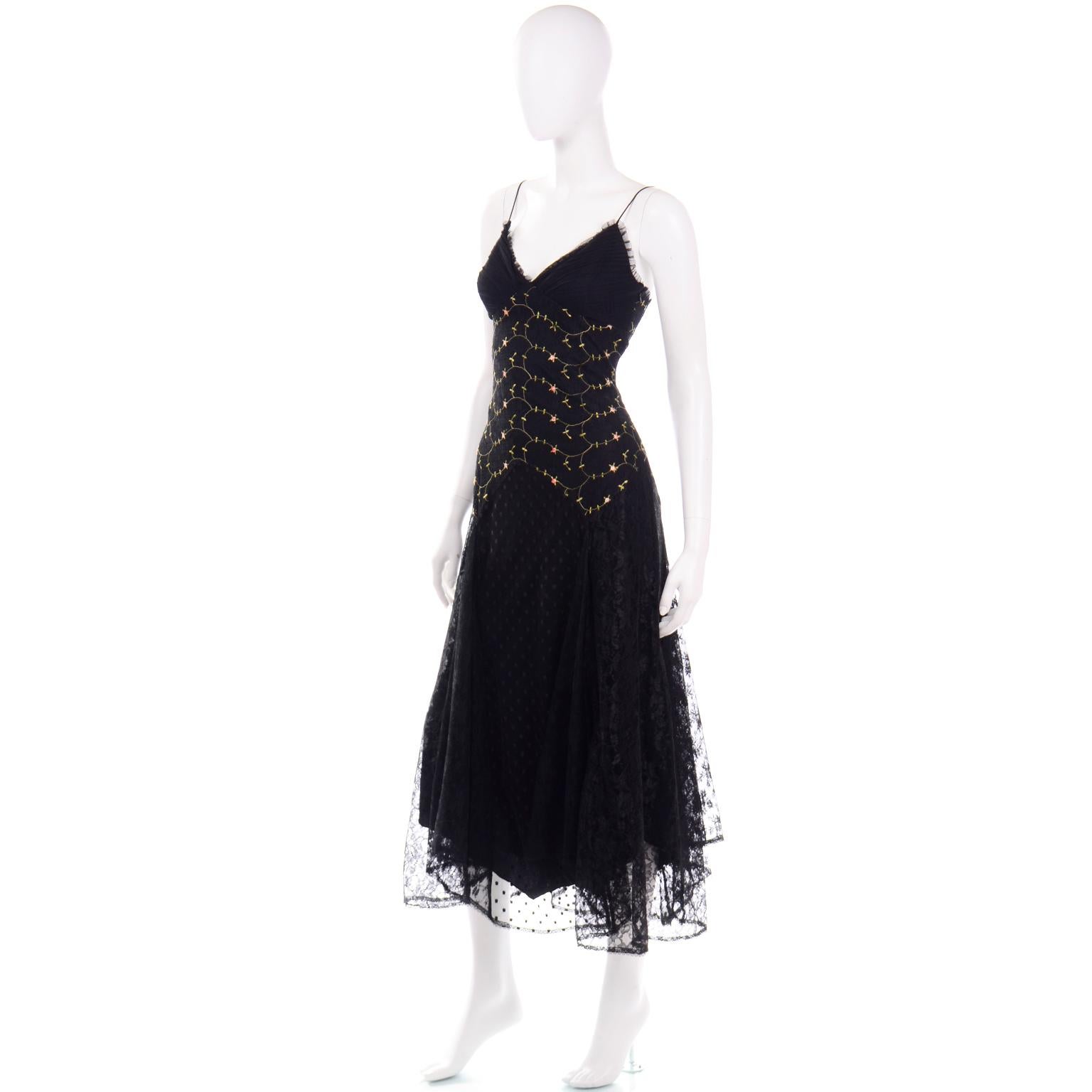 This vintage 1990's Betsey Johnson black lace and tulle embroidered evening dress is so pretty in person! Vintage Betsey Johnson pieces are always great to collect but more importantly, they are so much fun to wear! This dress has a beautiful mix of