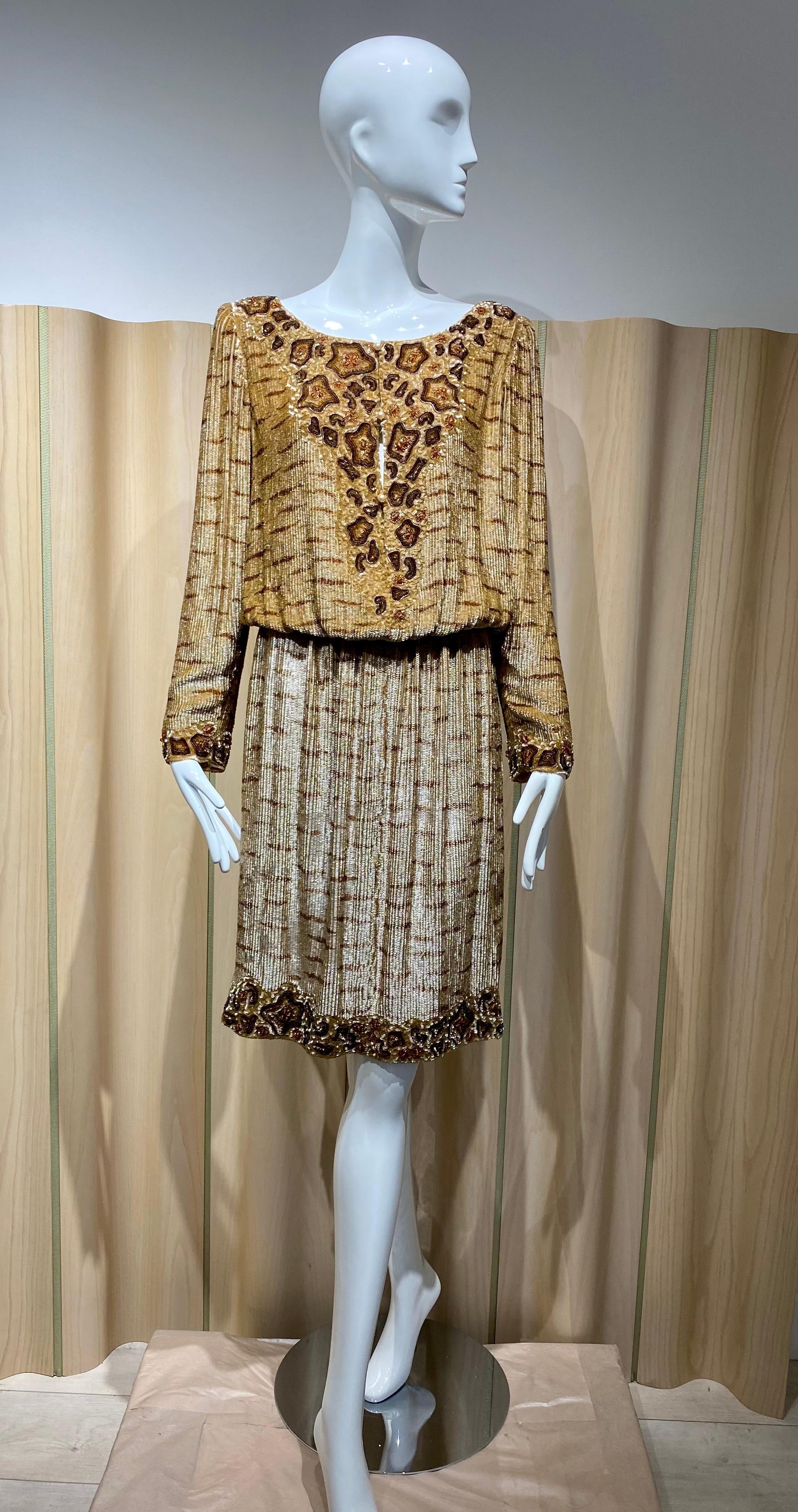 Vintage 90s Bill Blass Brown Printed Beaded Embellished metallic sequin long sleeve cocktail dress .
Dress has elastic waist and fully lined in silk.
  Small to Medium
Measurement: Bust: 40” / Waist: elastic stretch from 28” -34”/ Hip: 42”/ Dress