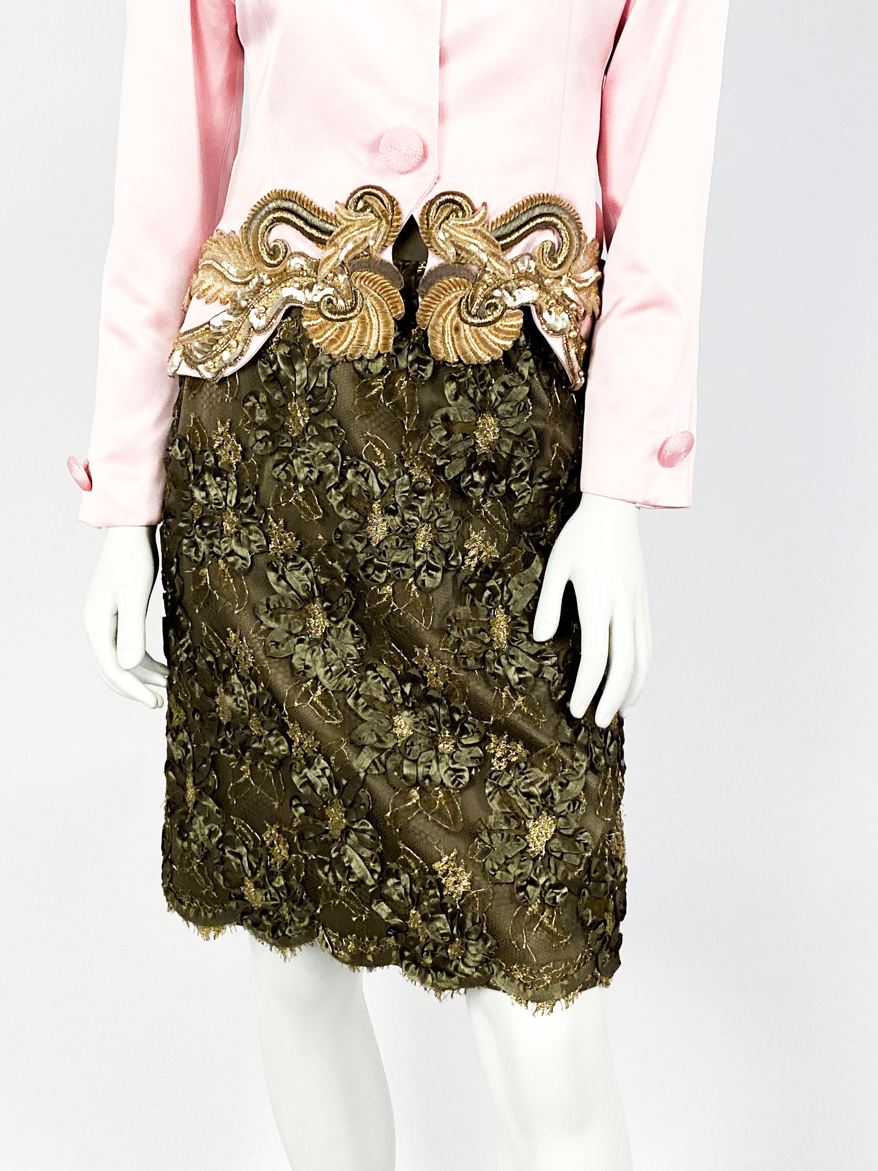 1990s Bill Blass silk-satin soft pink jacket with demensional passemterie applique, cordé covered buttons, and snap/hook closure. The skirt is an olive green color with ribbon work and metallic treading applied on mesh.  The hem of the jacket is