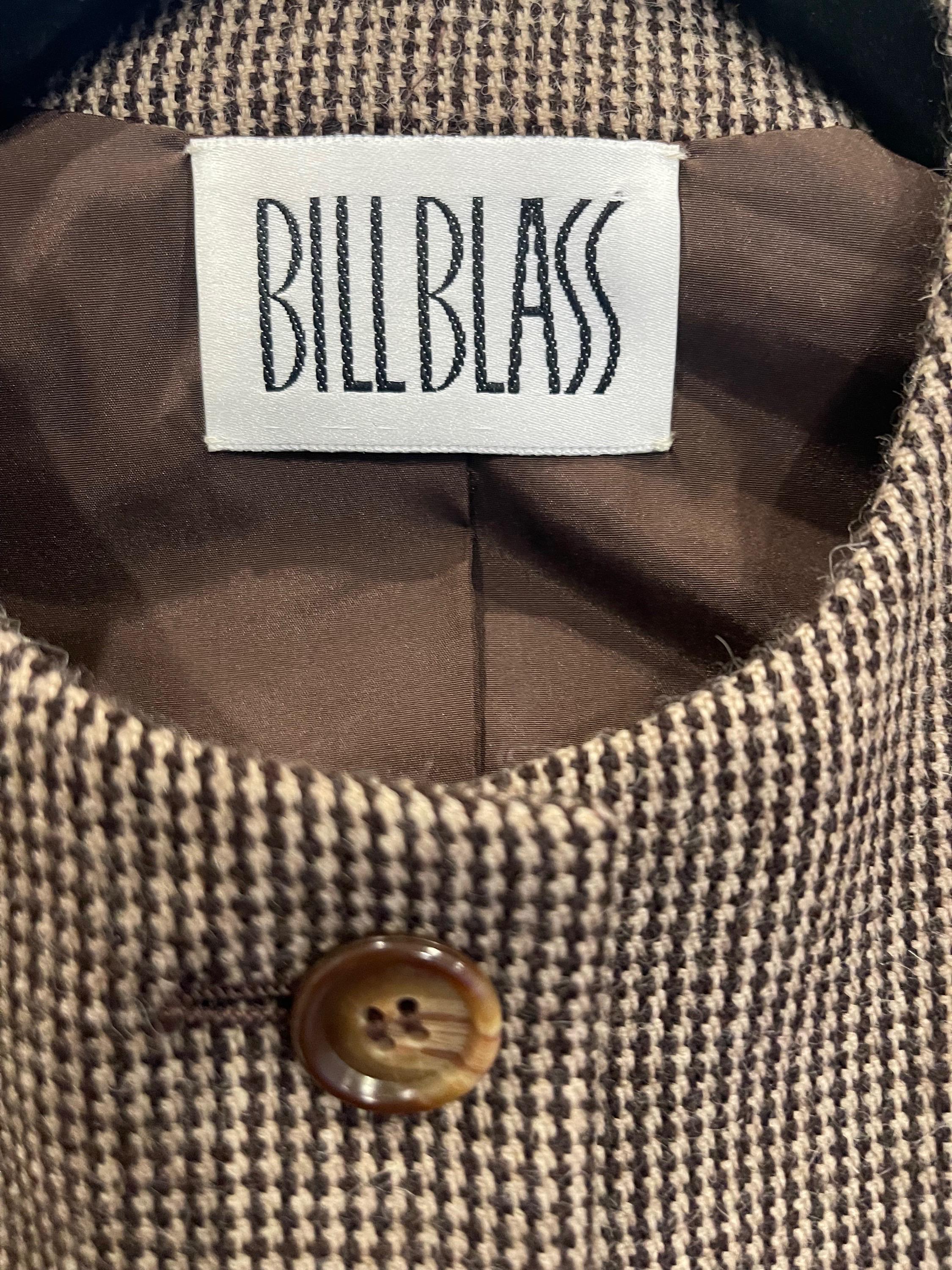 Chic early 90s Bill Blass for Saks Fifth Avenue brown tweed wool blazer jacket ! Features five buttons up the front. Brilliantly tailored for a sleek, stylish fit. Fully lined in brown silk. Pockets at each side of the waist.
Can easily be dressed