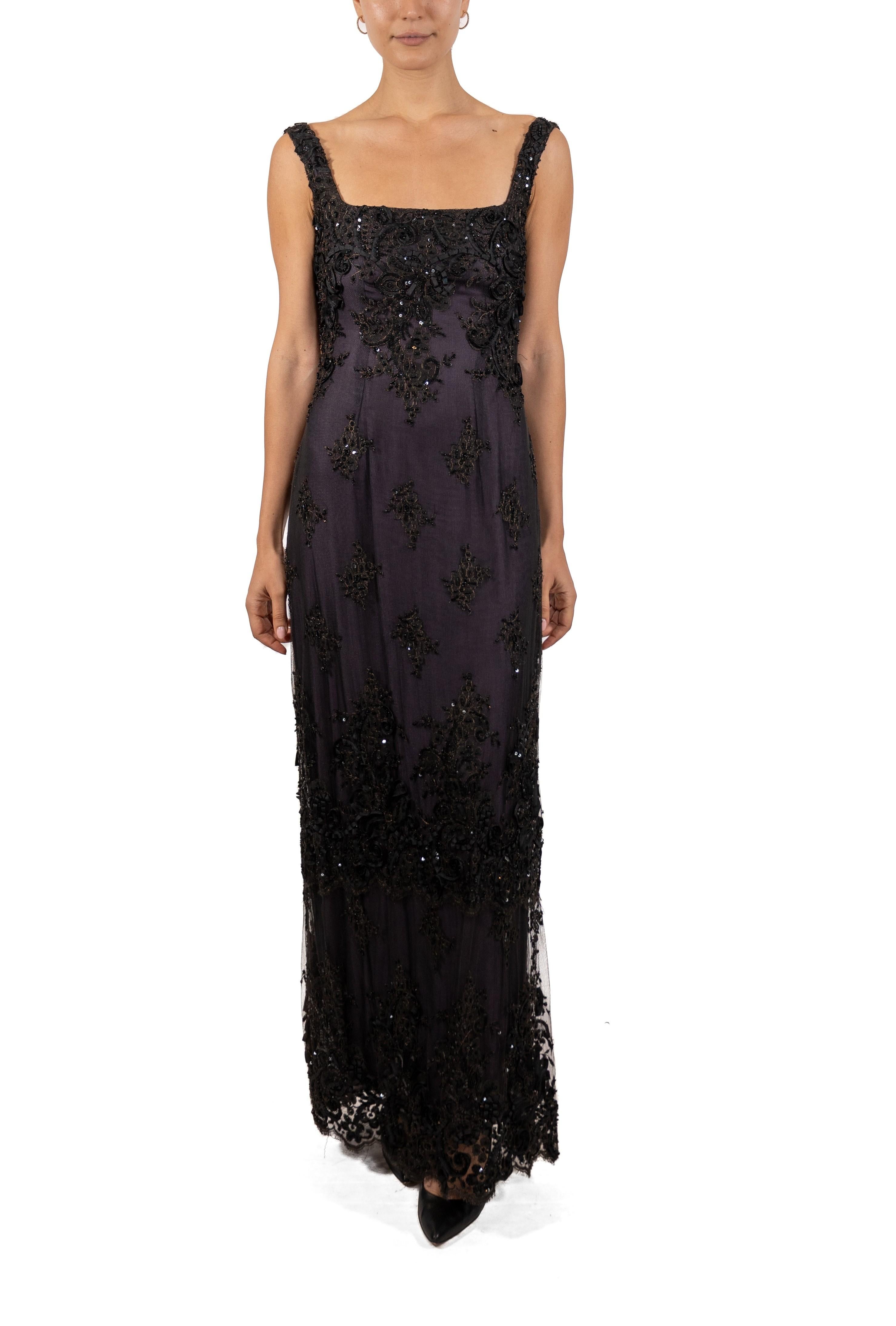 This gown retains no label, however the amount of hand-finishing points to Haute Couture or custom made quality, fully lined in silk. 1990S Black Beaded Silk Blend Chantilly Lace Gown With Purple Underlayer 