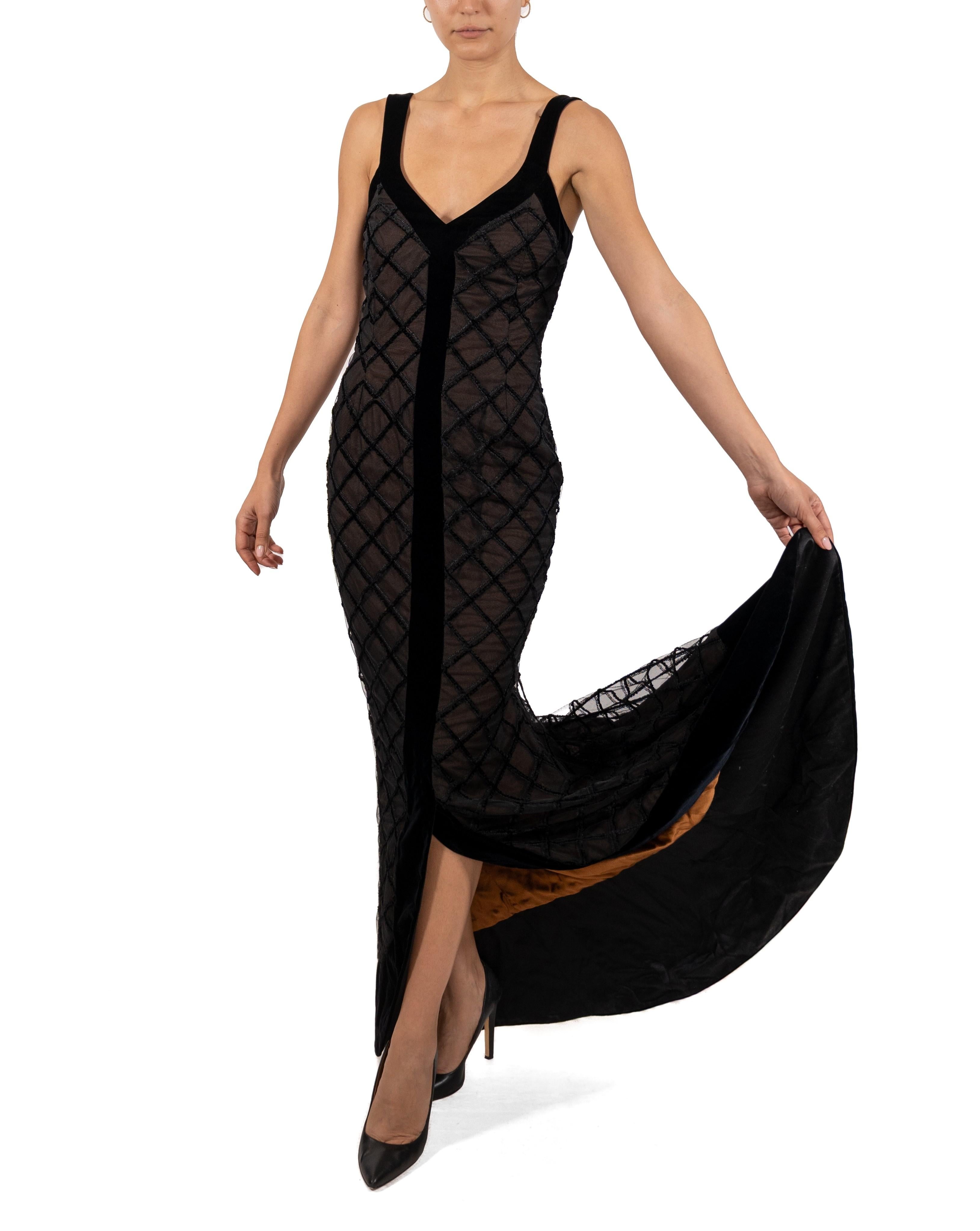 This gown retains no label, however the amount of hand-finishing points to Haute Couture or custom made quality, fully lined in silk. 1990S Black Cage Embroidered Silk & Rayon Tulle Long Line Gown With Velvet Train 