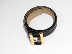 1990s Black Fendi Belt With Gold Logo Buckle
