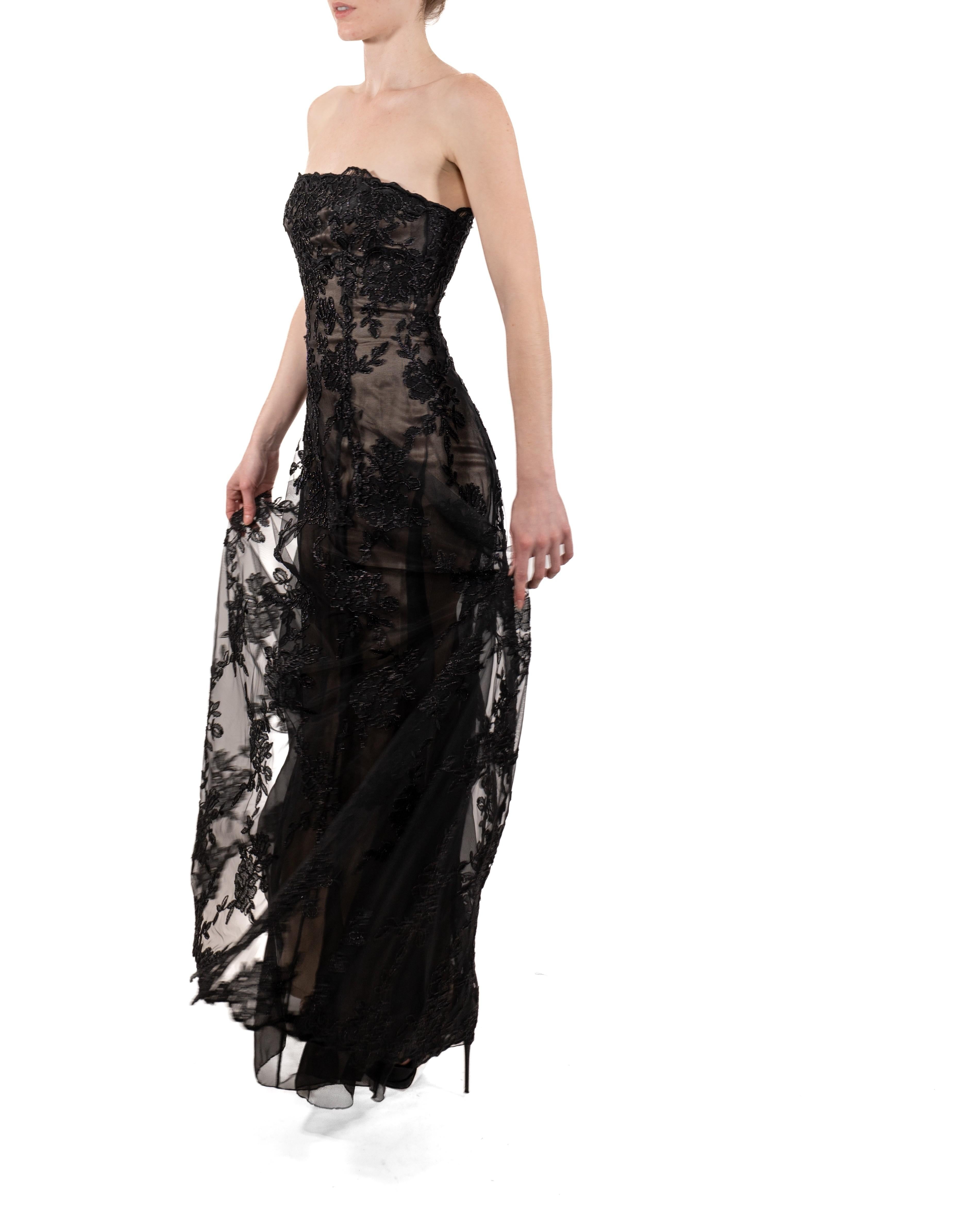 This gown retains no label, however the amount of hand-finishing points to Haute Couture or custom made quality, fully lined in silk. 1990S Black Metallic Embroidered Tulle Over Champagne Silk Strapless Gown 