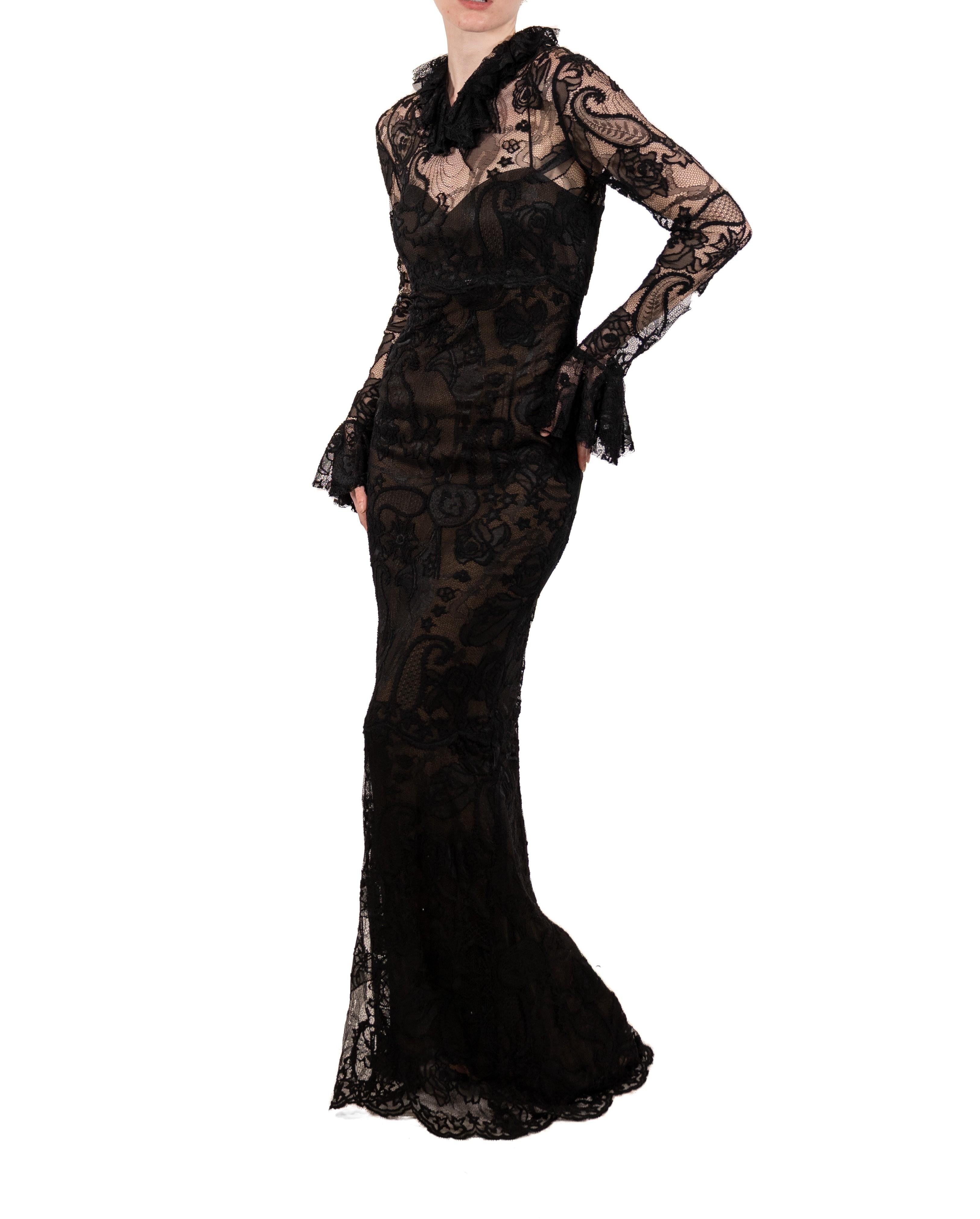 This gown retains no label, however the amount of hand-finishing points to Haute Couture or custom made quality, fully lined in silk. 1990S Black Rayon & Nylon Lace Long Sleeved Gothic Gown Lined In Silk 
