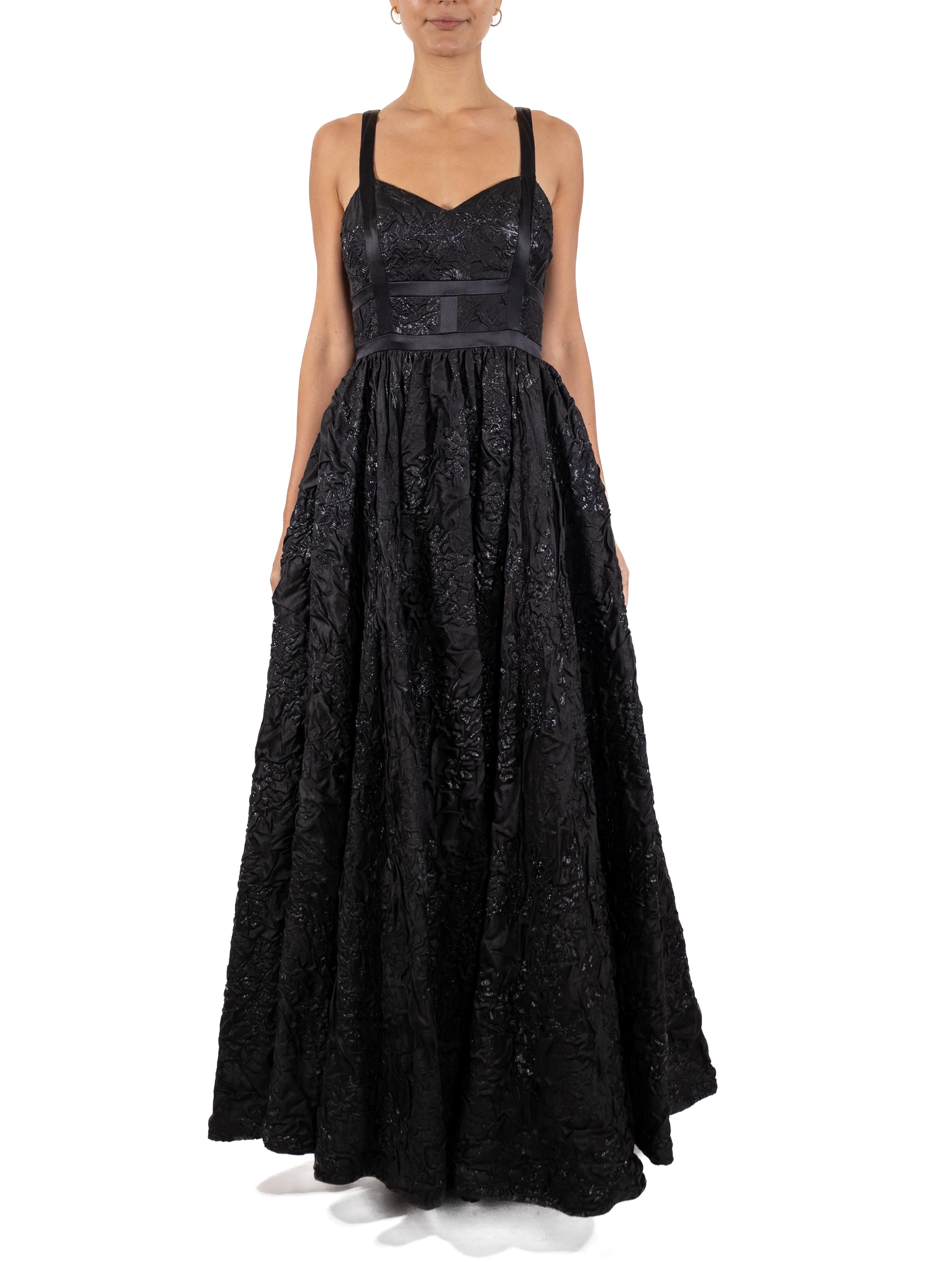 This gown retains no label, however the amount of hand-finishing points to Haute Couture or custom made quality, fully lined in silk. 1990S Black Silk Blend Matelassé Full Skirted Ball Gown Lined In Hot Pink With Pockets 