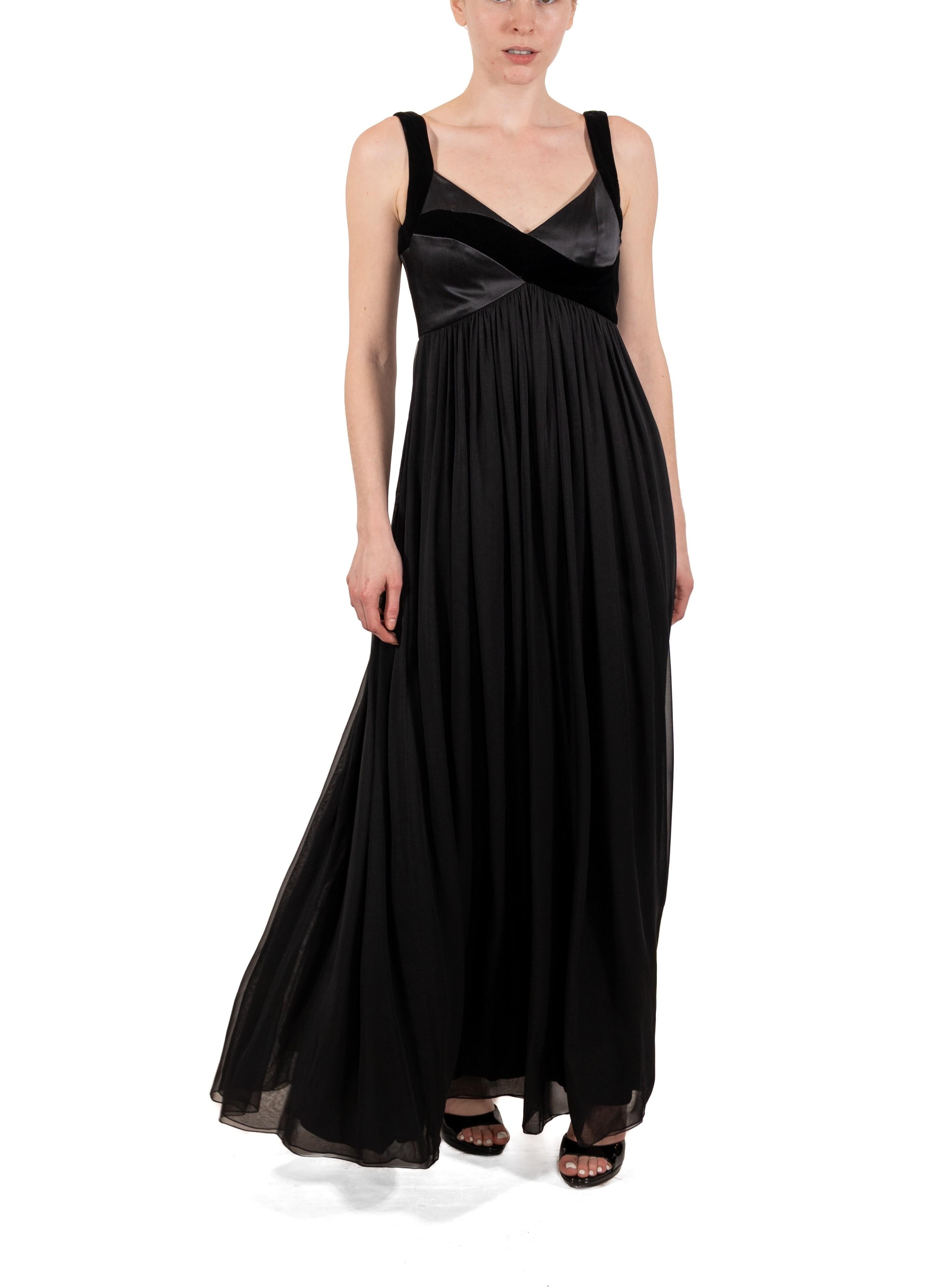 This gown retains no label, however the amount of hand-finishing points to Haute Couture or custom made quality, fully lined in silk. 1990S Black Silk Chiffon & Velvet Asymmetrical Empire-Waist Gown 