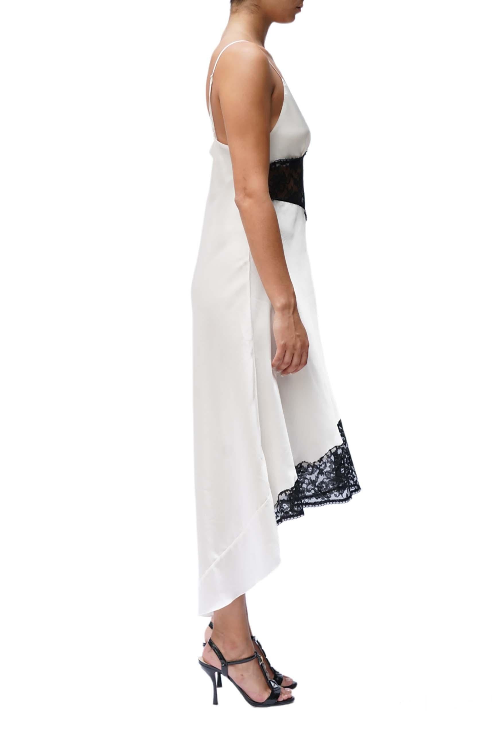 white slip dress with black lace