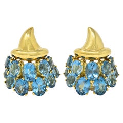 1990's Blue Topaz 18 Karat Yellow Gold Vintage Cornucopia Ear-Clip Earrings