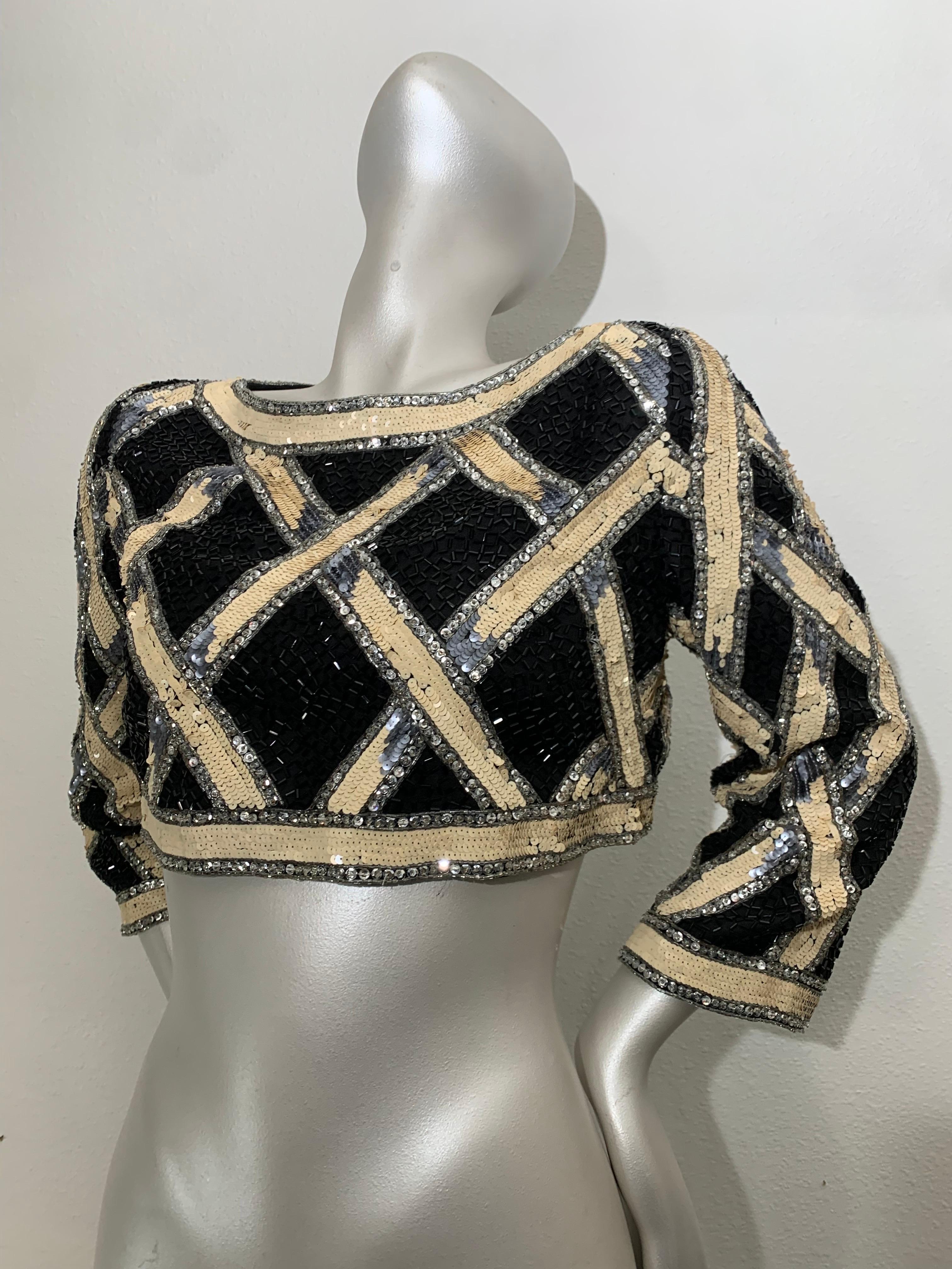 1990s Bob Mackie Beaded and Sequin Lattice Pattern Evening Cropped Bolero Jacket: Exquisitely hand embellished with myriad bugle beads, sequins and rhinestones in a trompe l'oeil trellis pattern in cream, gray and black. Straight and narrow
