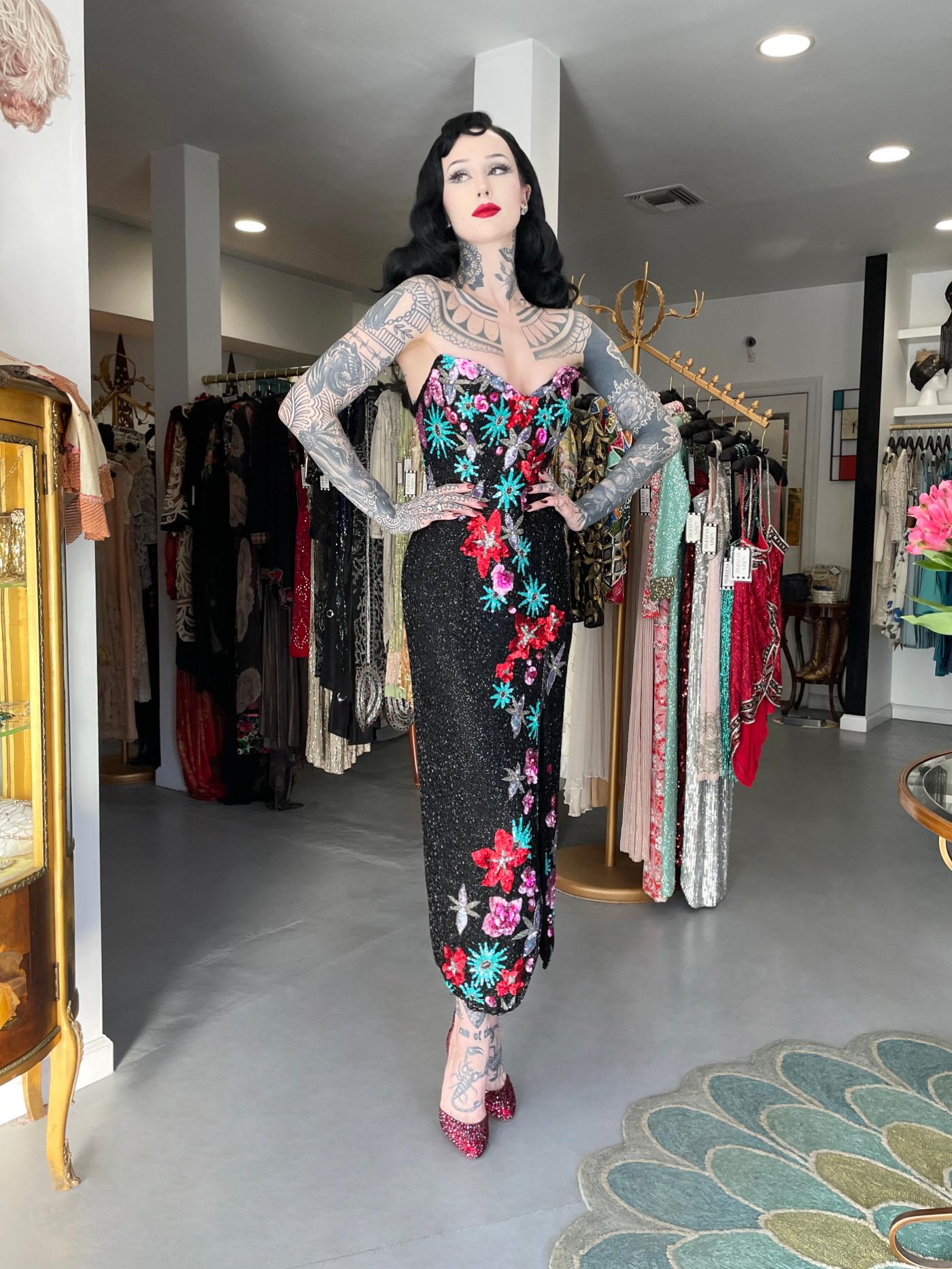 An absolutely breathtaking and super seductive Bob Mackie fully-beaded silk floral motif hourglass gown dating back to the early 1990's. Bob Mackie began his career as a Hollywood costuming sketch artist, working for both Edith Head and Jean Louis.