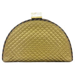 Pochette Bottega Veneta anni '90 trapuntata d'oro con chiusura in lucite