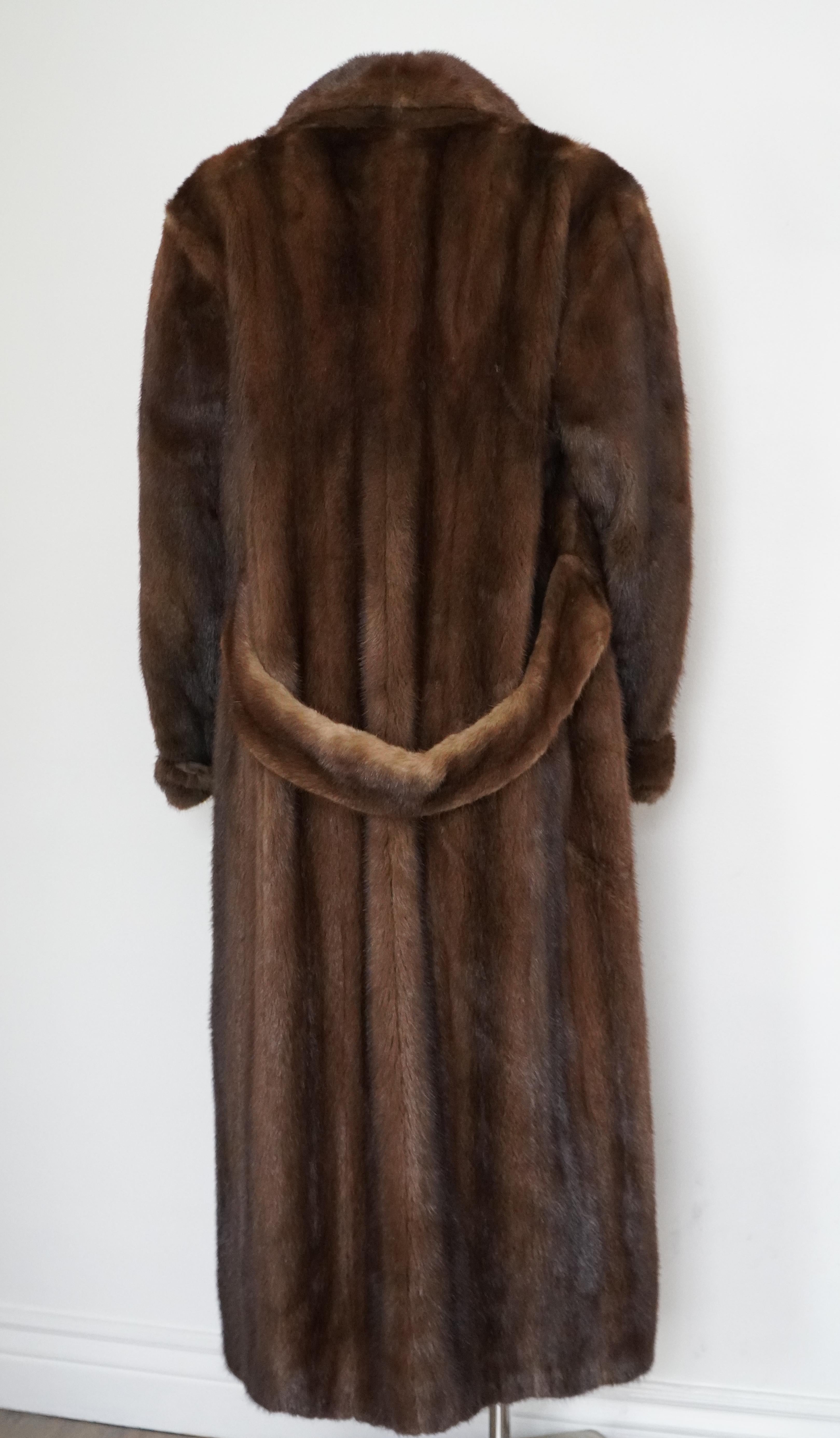 This exquisite vintage genuine mink fur coat exudes timeless elegance and luxury. Circa 1990s, made by Brothers II Style by Dimitrios NY. This chestnut brown coat is crafted with the finest quality genuine mink fur, it boasts a rich, lustrous