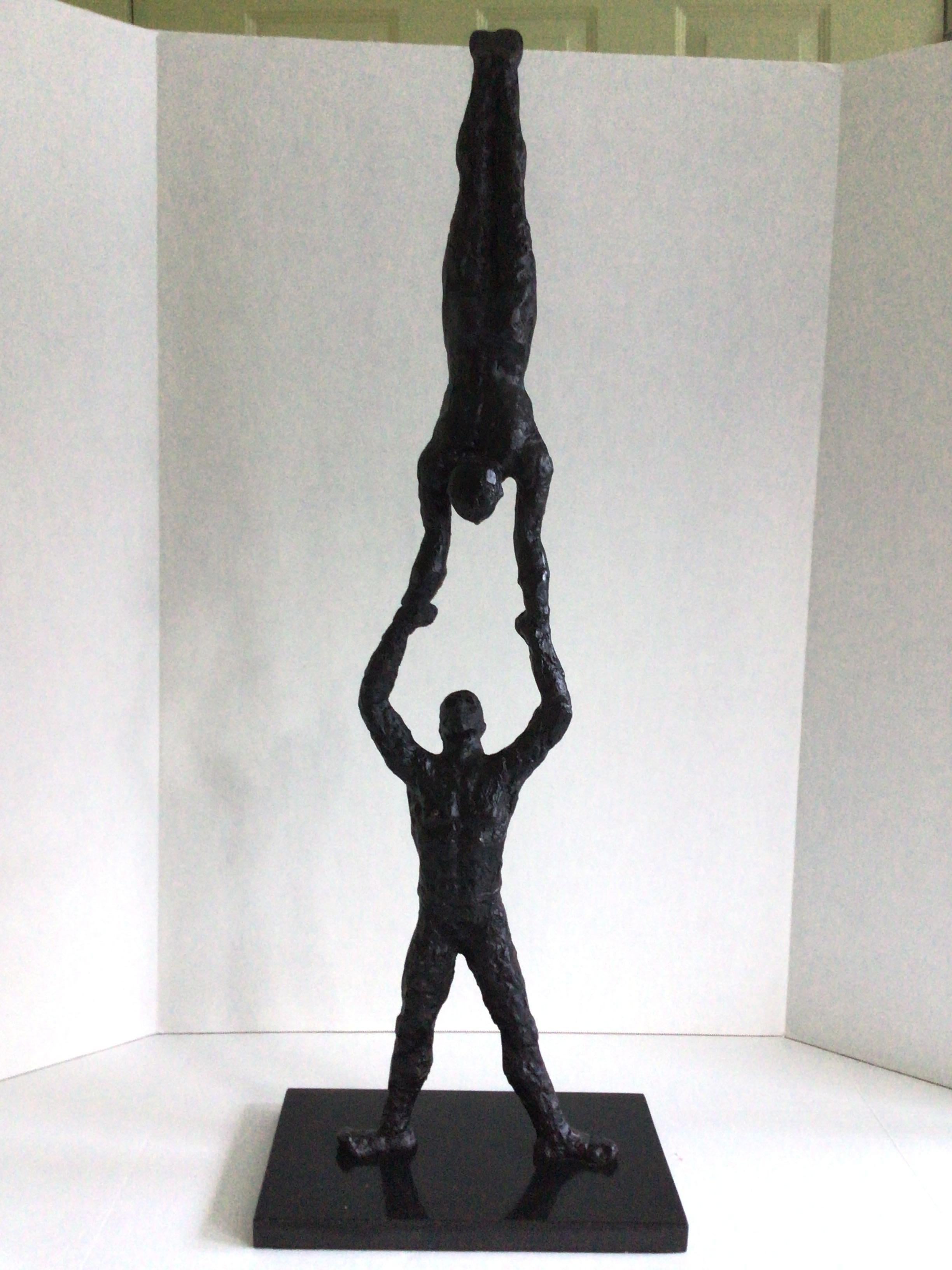 1990s Brutalist Cast Iron Sculpture of acrobats on a Marble Base
Black marble base
Felt on bottom of base