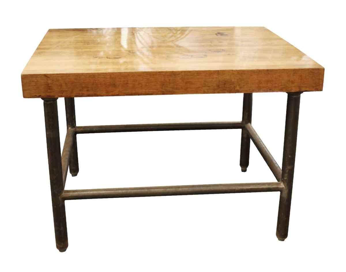 1990s low table with 3 in. thick butcher block top and nicely finished with vintage pipe legs. This can be seen at our 302 Bowery location in Manhattan.