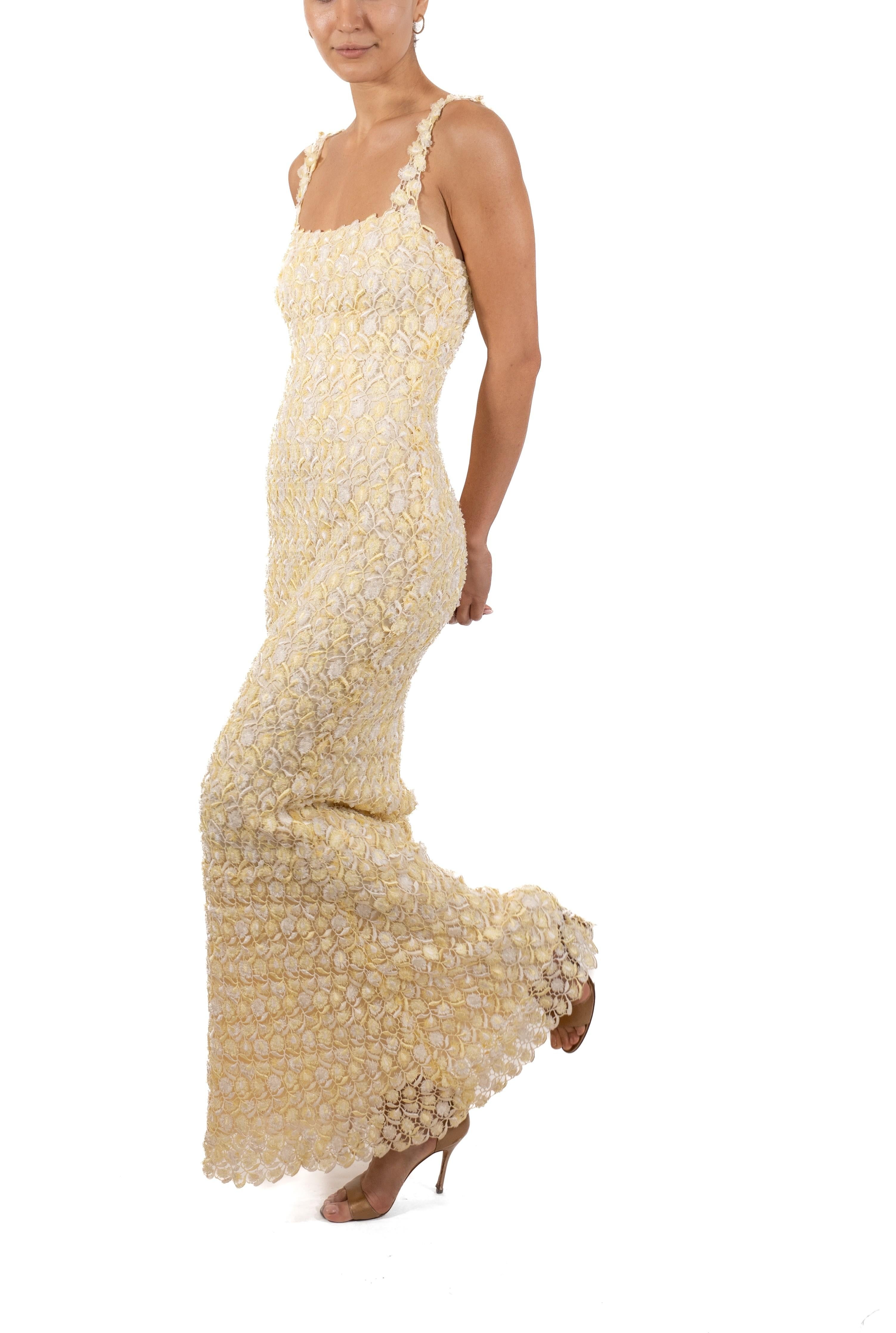 This gown retains no label, however the amount of hand-finishing points to Haute Couture or custom made quality, fully lined in silk. 1990S Butter Yellow & White Rayon/Lurex Lace Gown Lined In Silk 