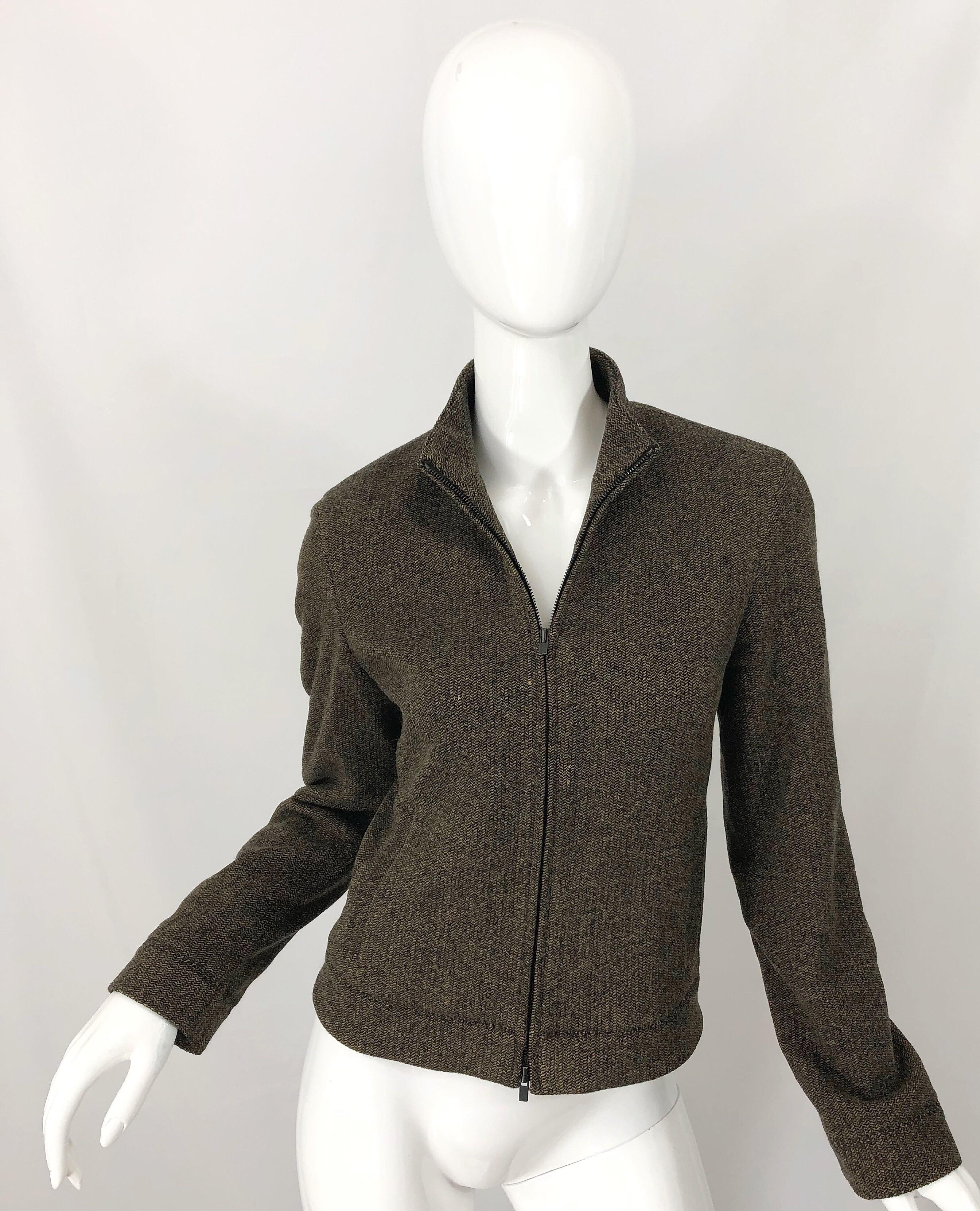 Chic vintage 1990s CALVIN KLEIN COLLECTION brown cashmere blend jacket! Features the softest cashmere (47%), wool (30%), angora (20%), and spandex (3%) fabric. Sleek tailored fit. Zips up the front. Fully lined. Pockets at each side of the waist.